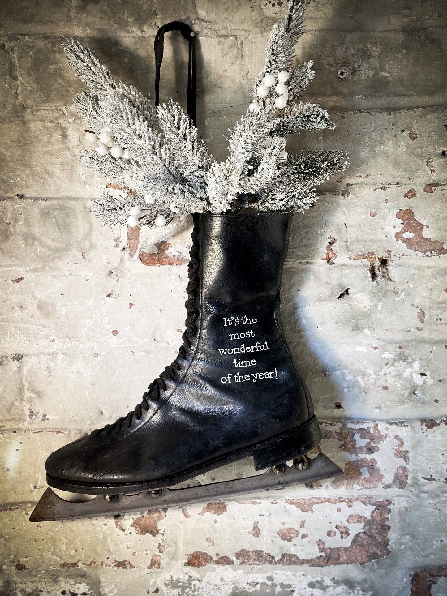 A beautiful vintage Christmas ice skate hand painted using traditional sign writer’s techniques and materials