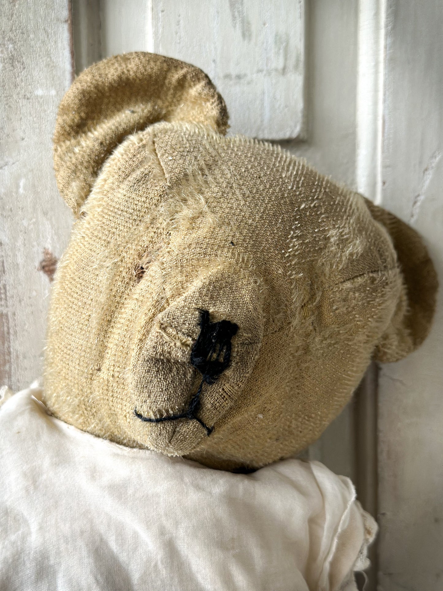 A wonderful well loved antique French teddy bear