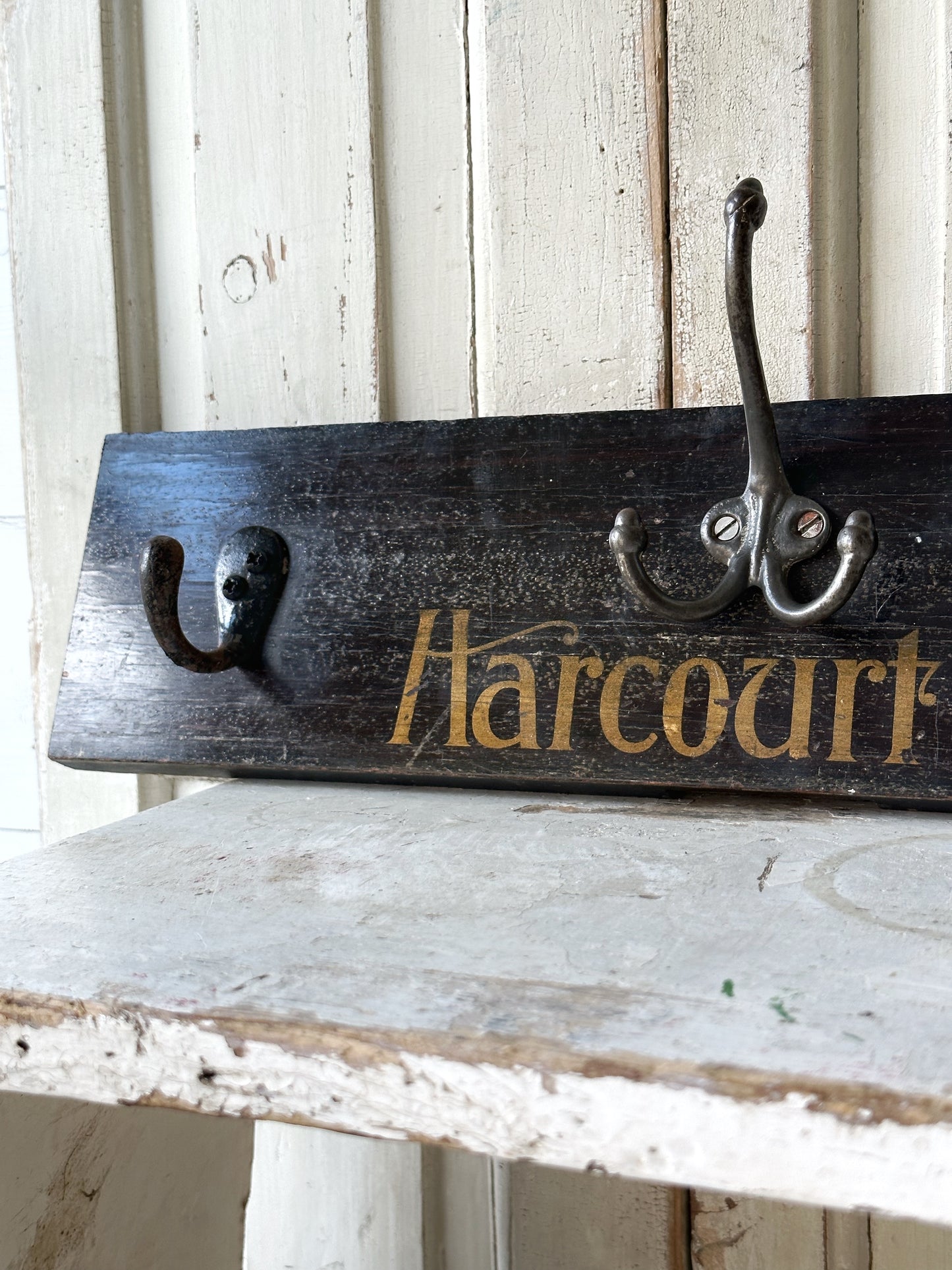 Salvaged sign written drawer front coat pegs