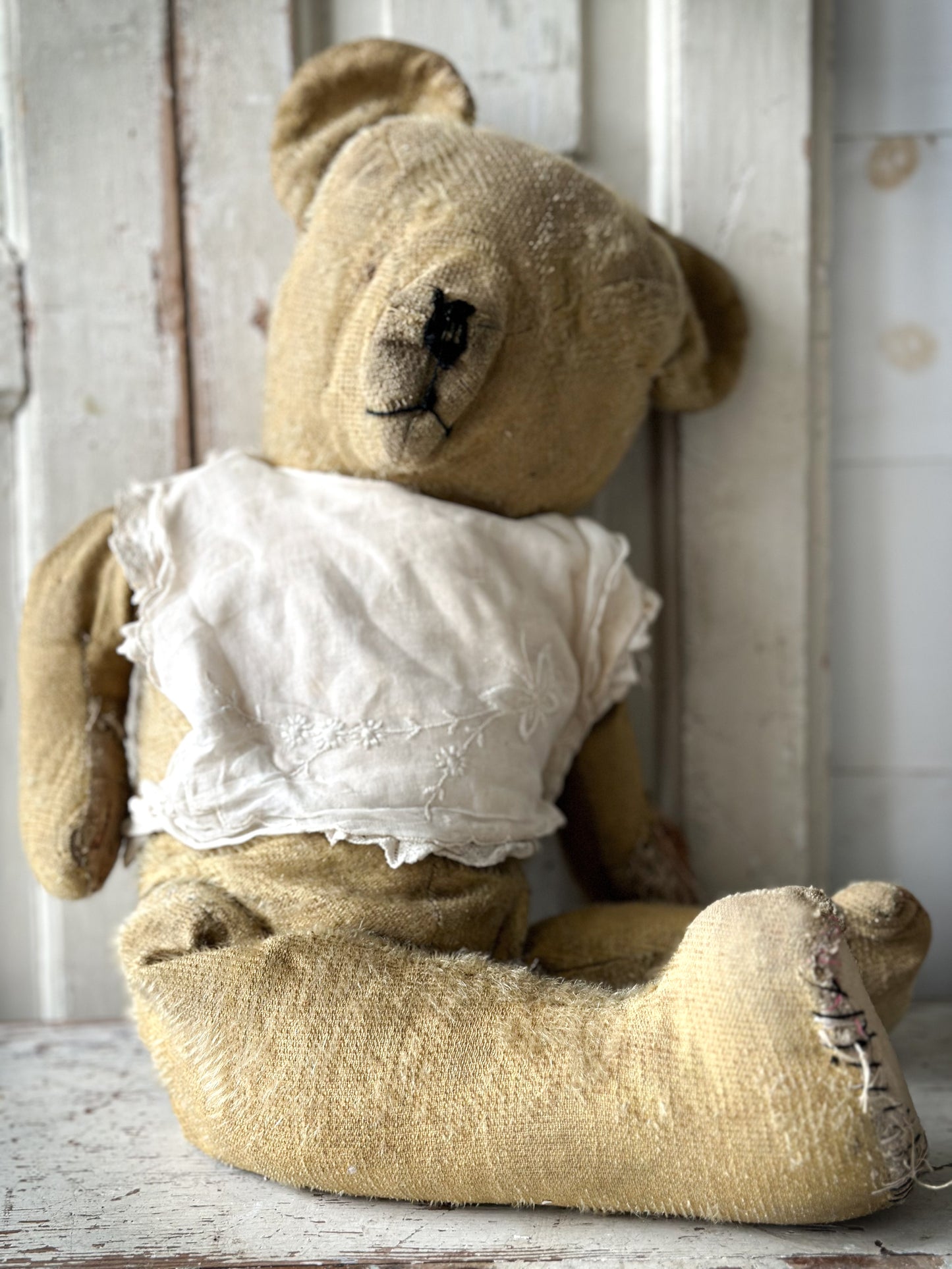 A wonderful well loved antique French teddy bear