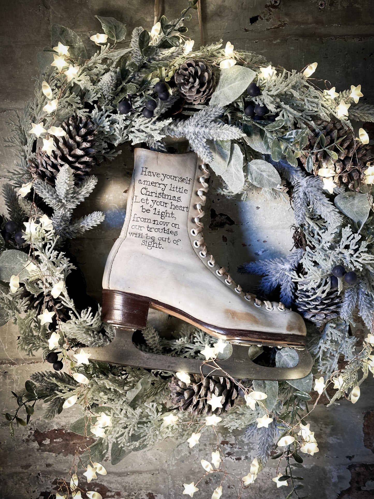 A beautiful vintage Christmas ice skate hand painted using traditional sign writer’s techniques and materials