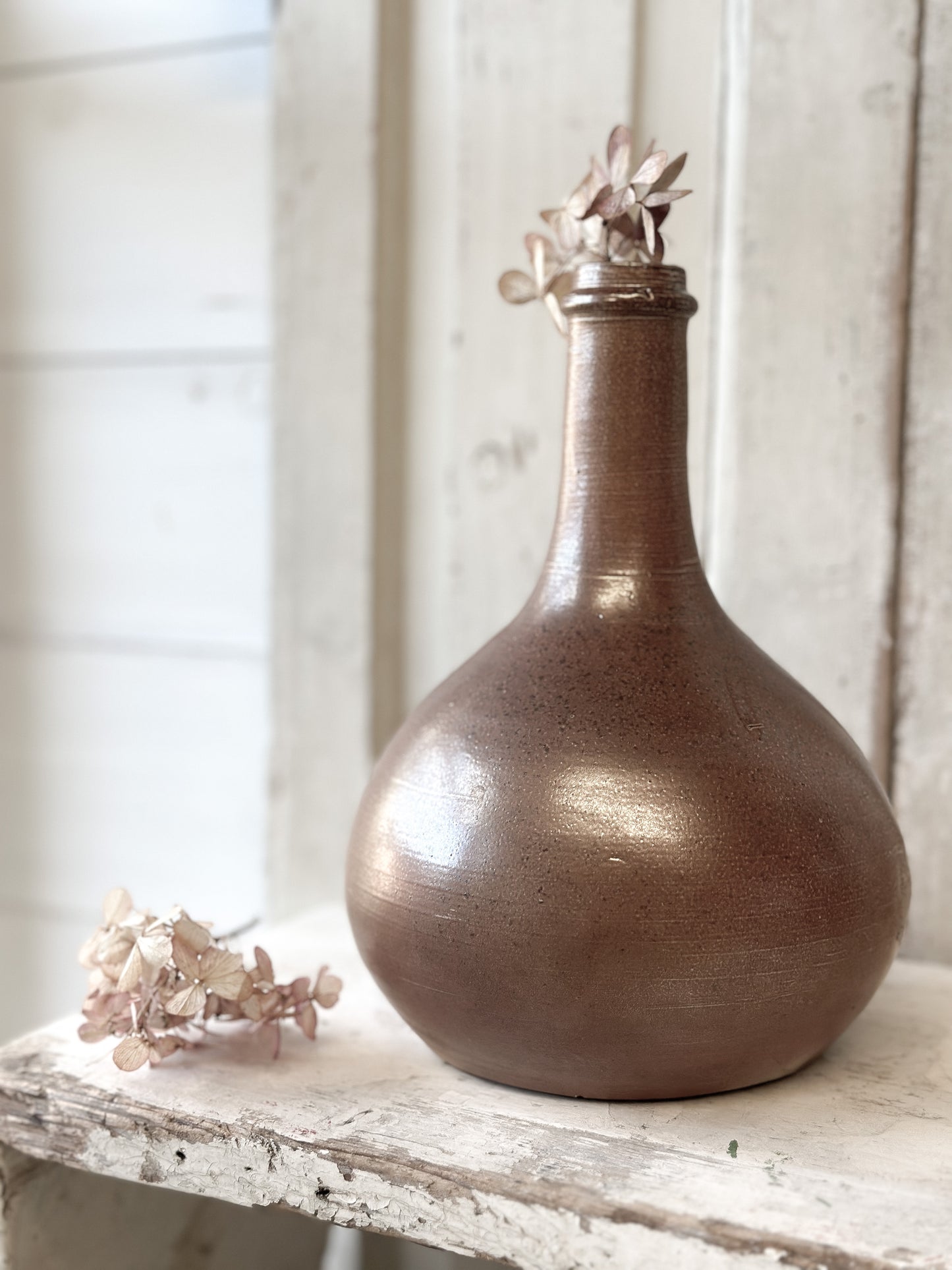 A wonderful antique French glazed wine bottle