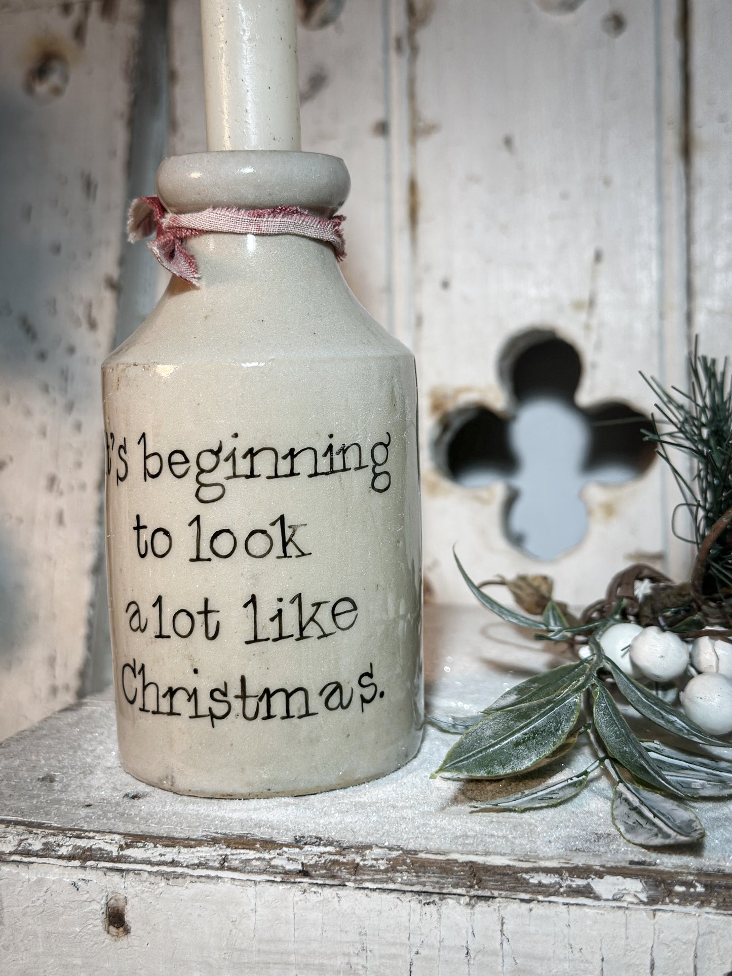 A Victorian unearthed stoneware pottery tall bottle with a hand painted quote