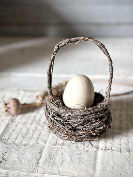 Vintage broody egg and bird nest basket