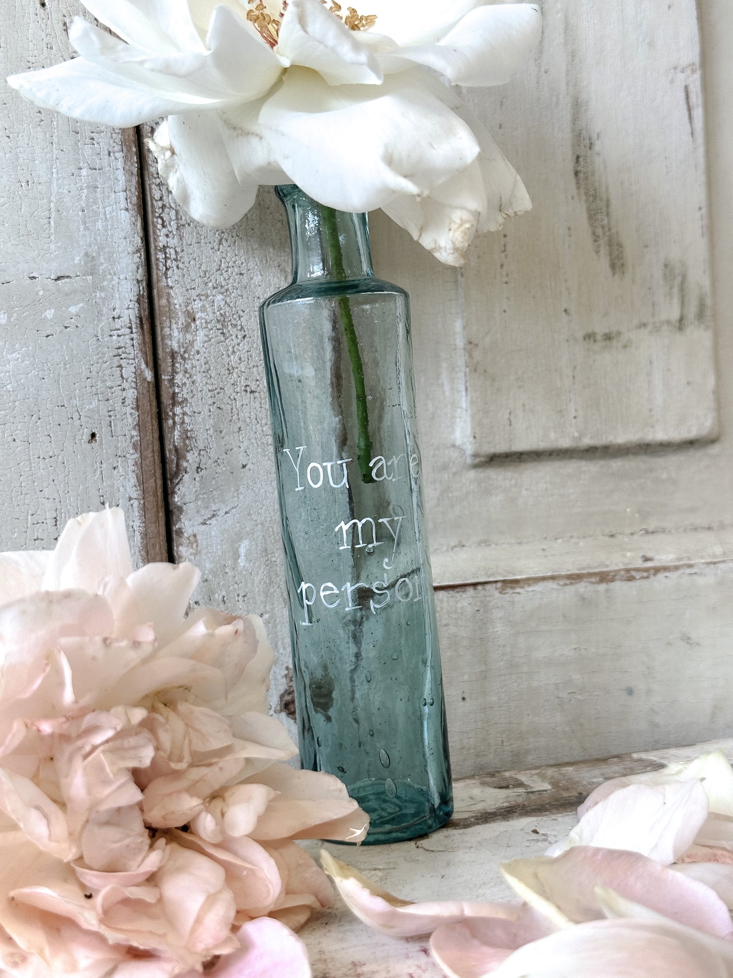 A beautiful Victorian bottle with a hand painted quote