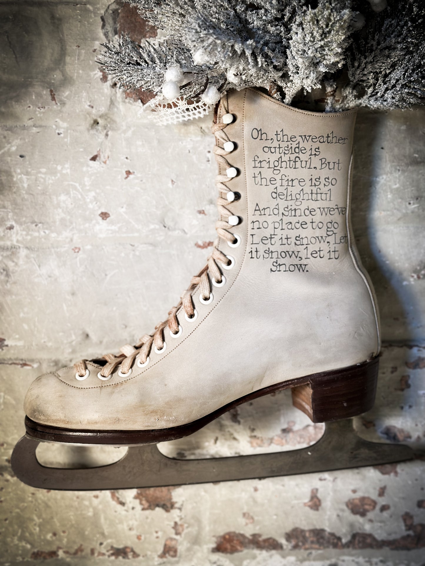 A beautiful vintage Christmas ice skate hand painted using traditional sign writer’s techniques and materials