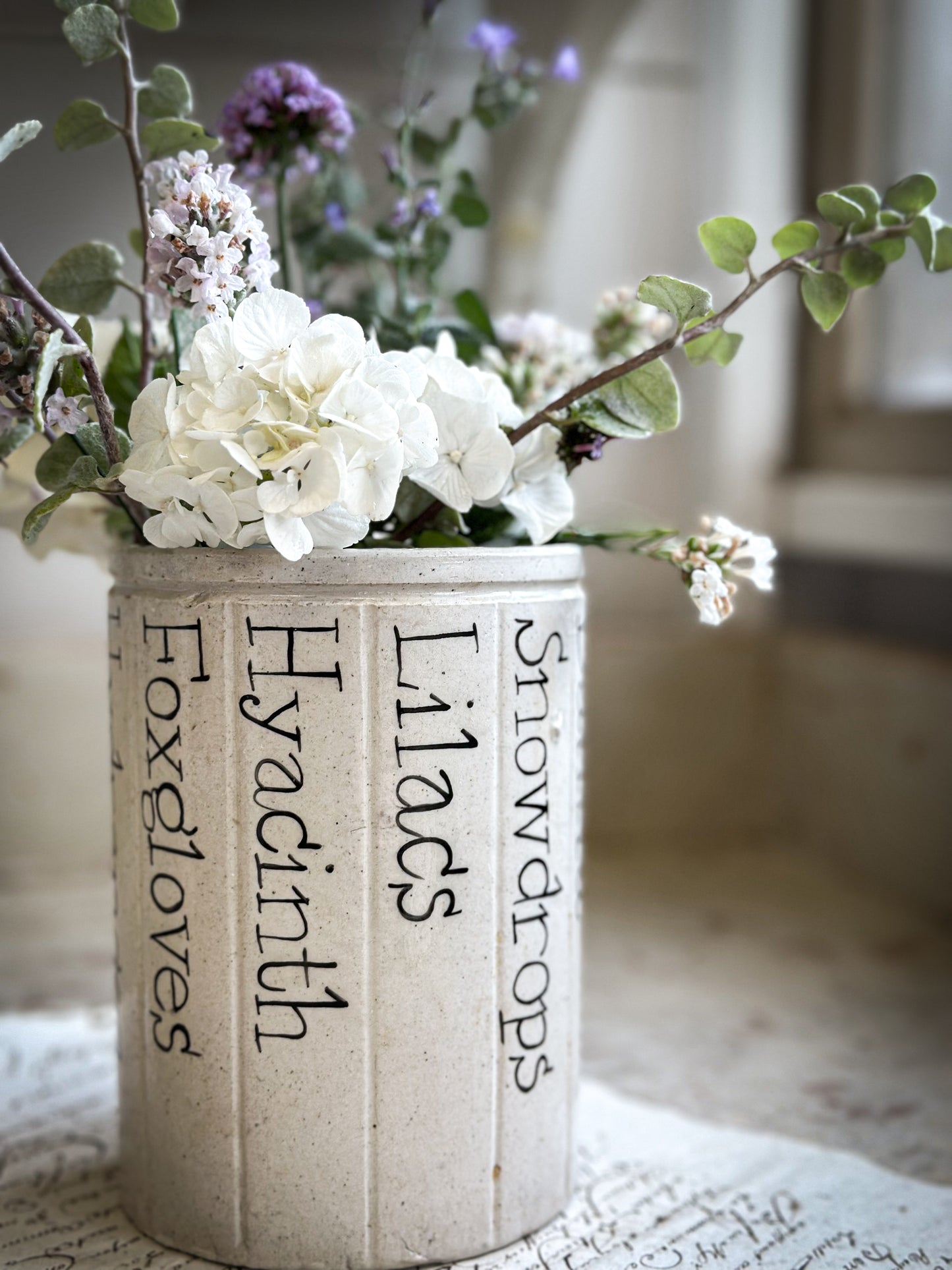 A Victorian Stoneware Preserve jar with hand painted botanical names pot