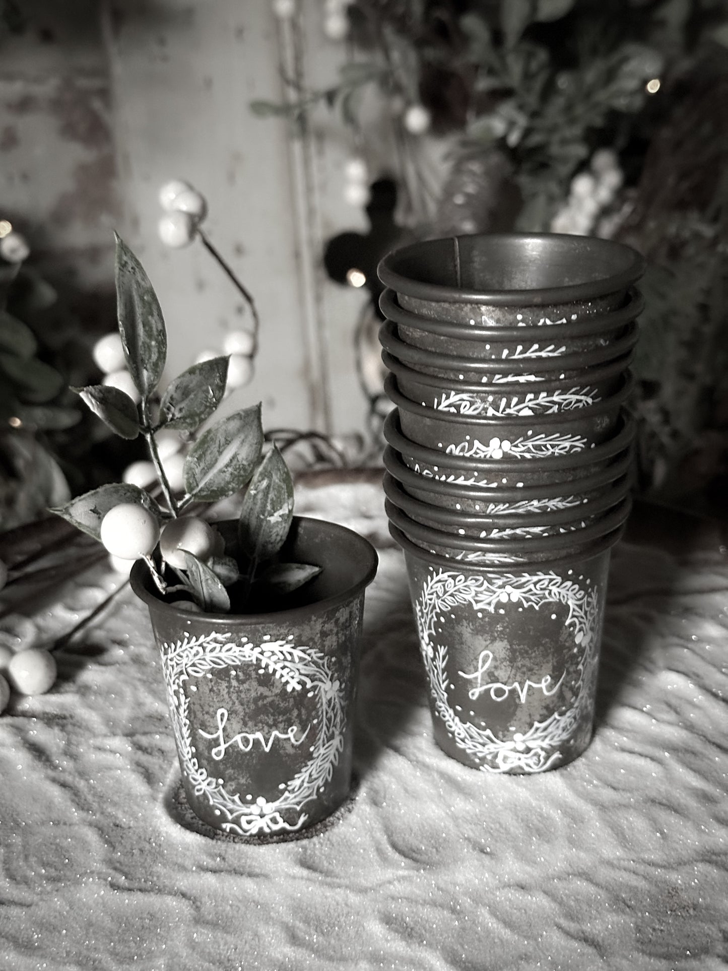 A pretty hand painted Dariole tin tea light holder