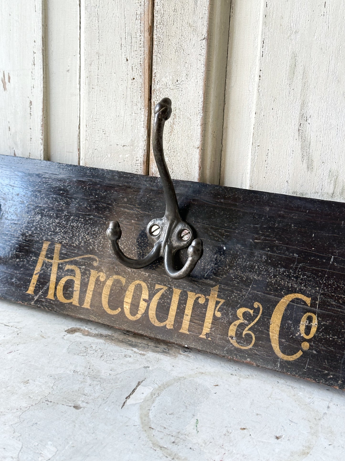 Salvaged sign written drawer front coat pegs