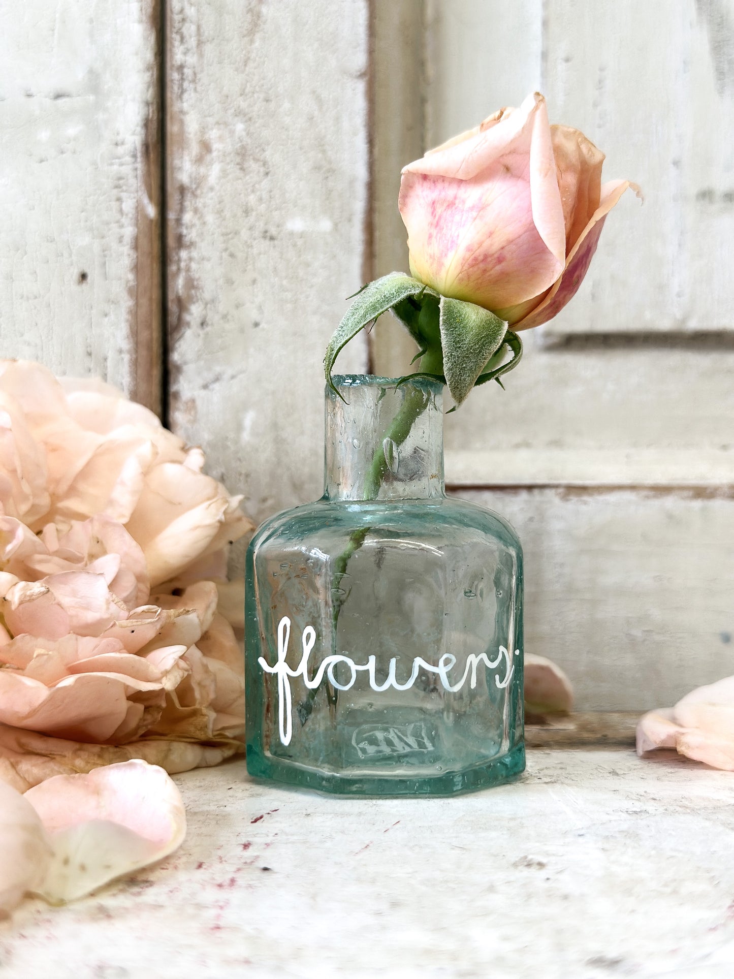 A beautiful Victorian bottle with a hand painted quote