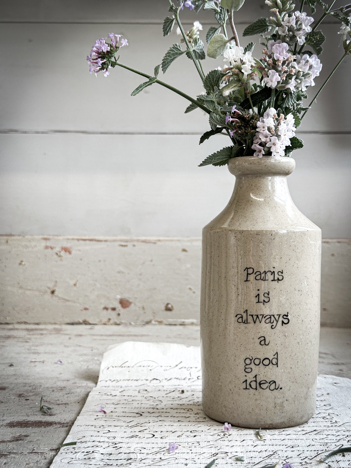 A Victorian unearthed short stoneware pottery bottle with a hand painted quote