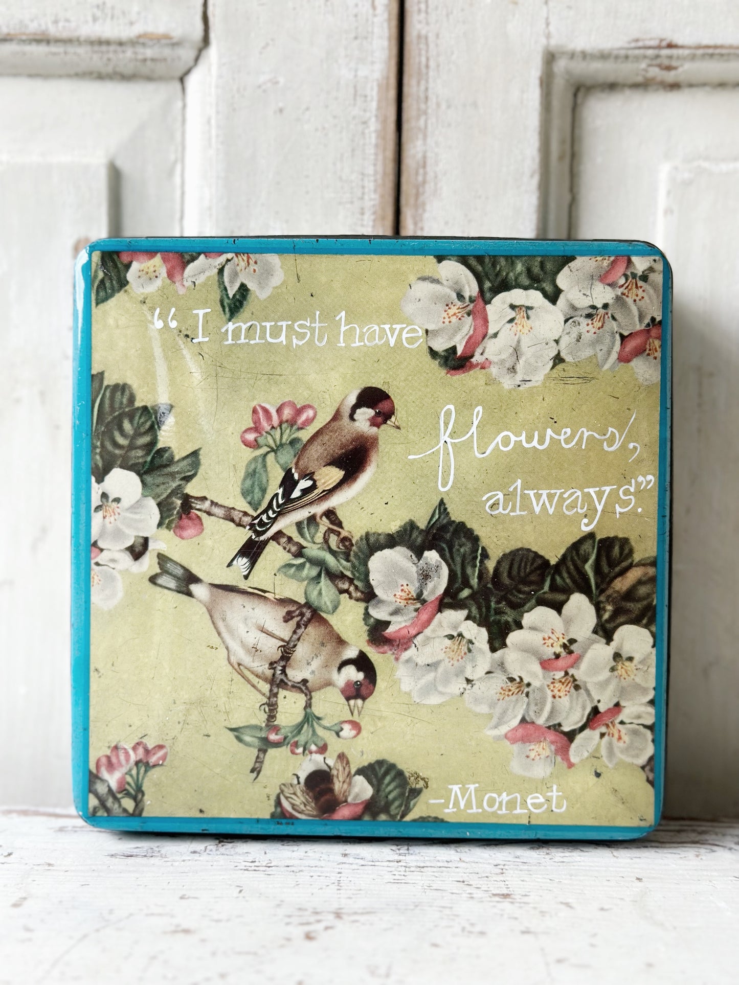 A pretty antique tin with a hand painted quote.
