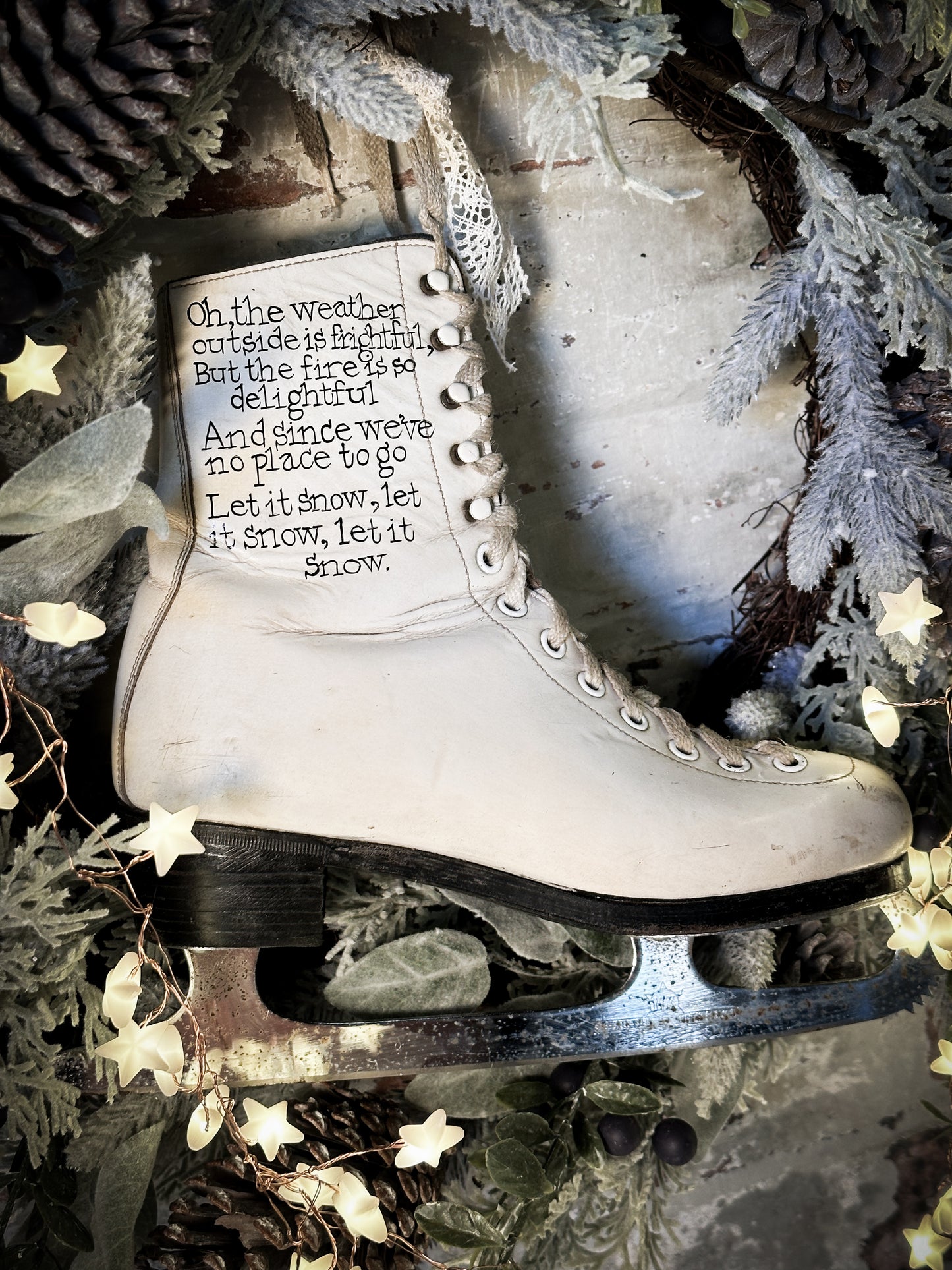 A beautiful vintage Christmas ice skate hand painted using traditional sign writer’s techniques and materials