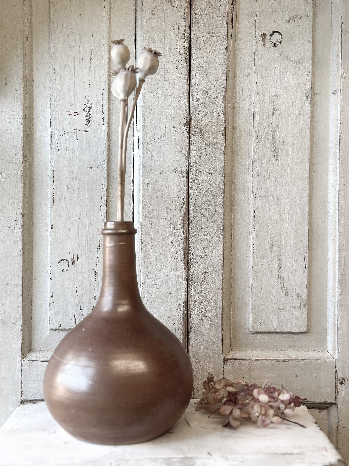A wonderful antique French glazed wine bottle