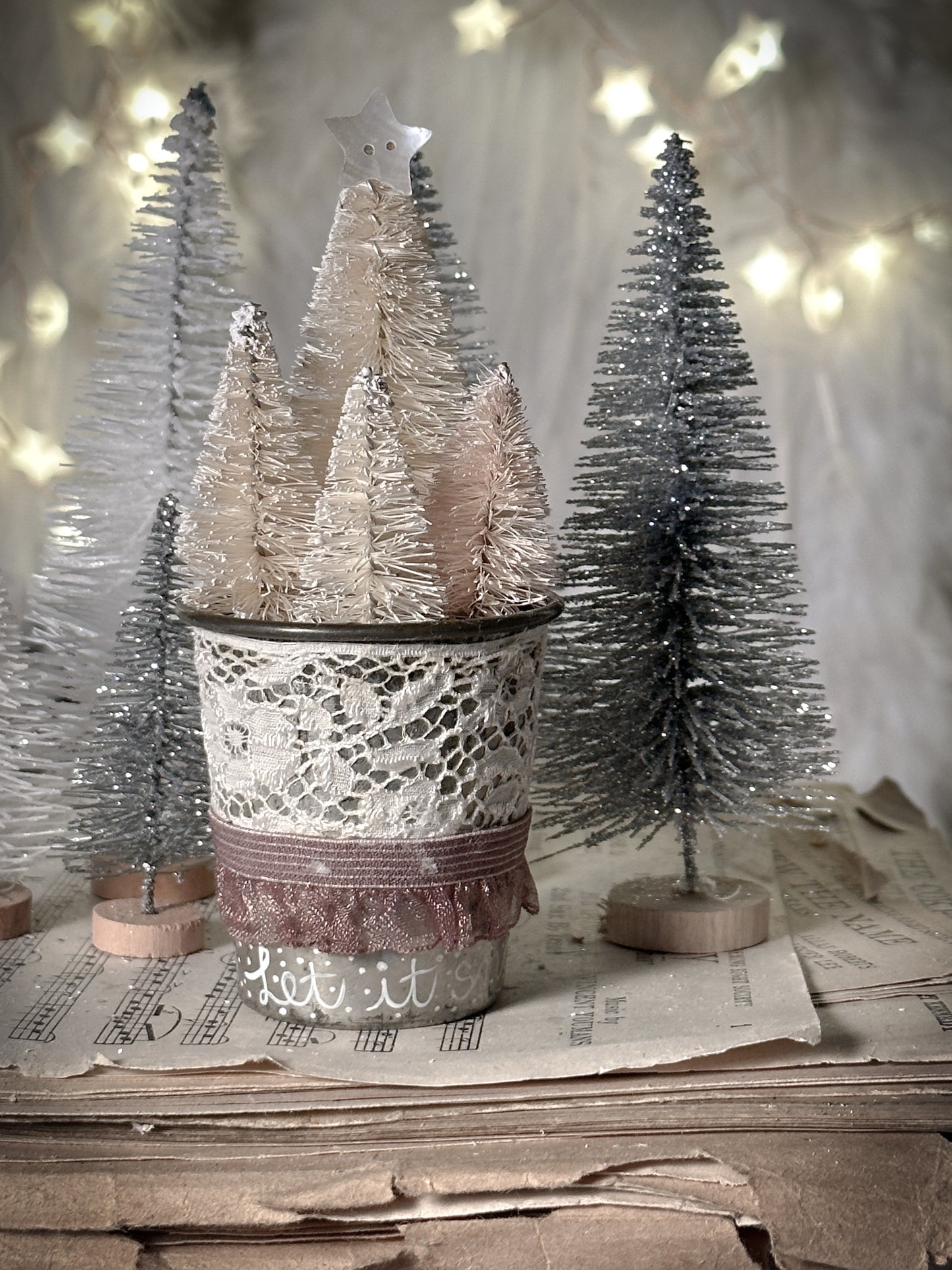 A hand painted vintage Dariole tin with lace trimming and a Christmas quote