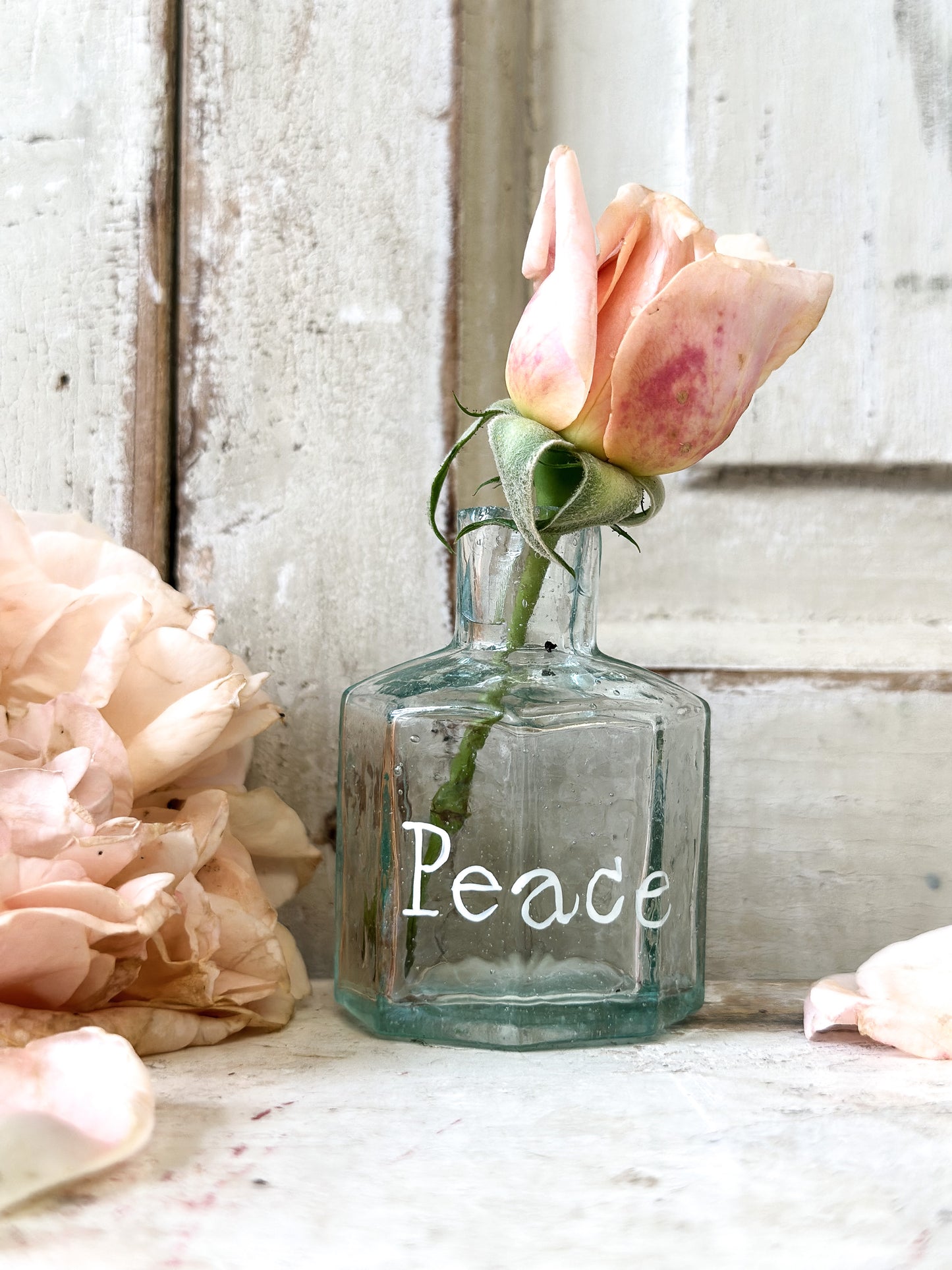 A beautiful Victorian bottle with a hand painted quote