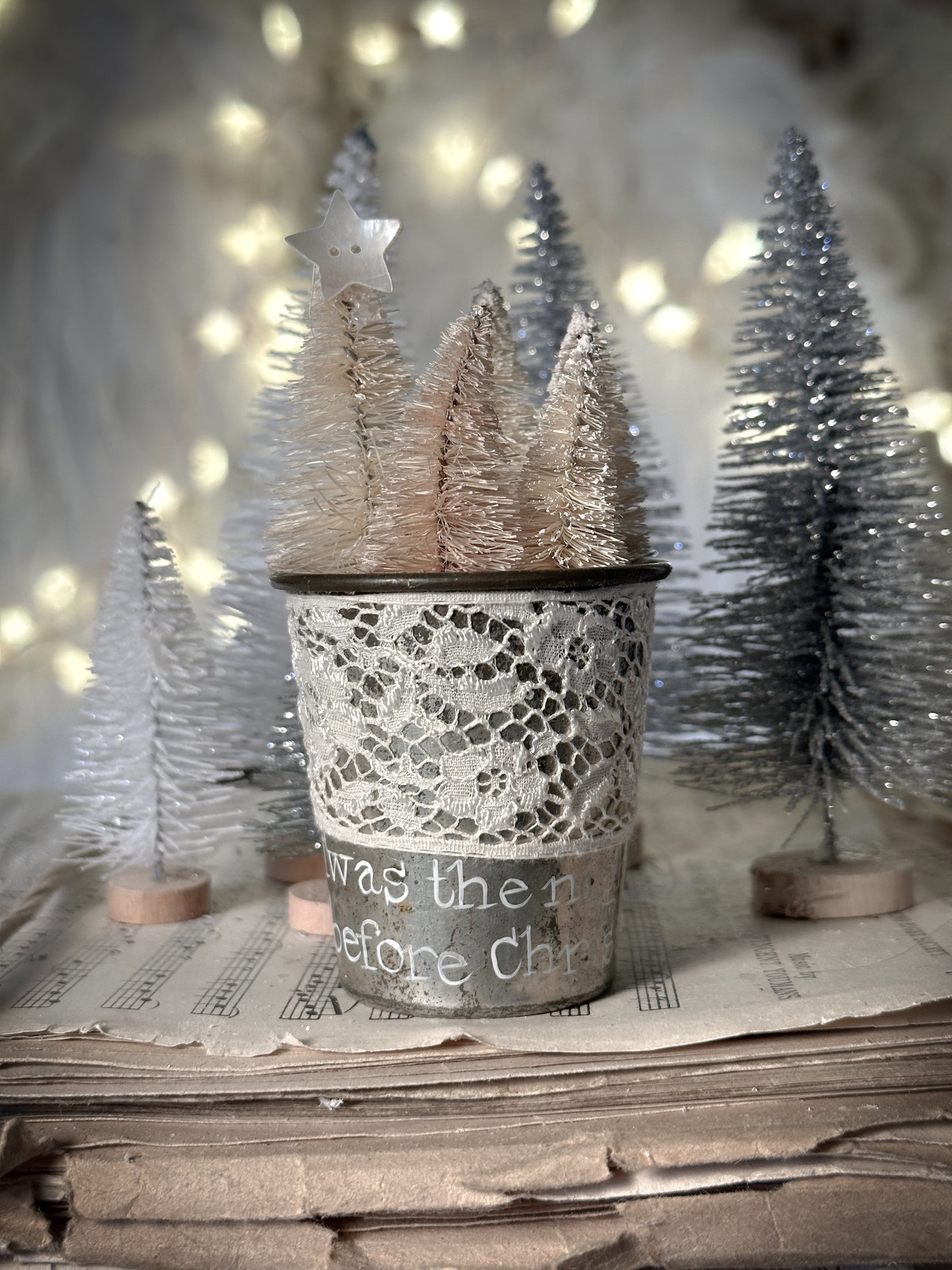 A hand painted vintage Dariole tin with lace trimming and a Christmas quote