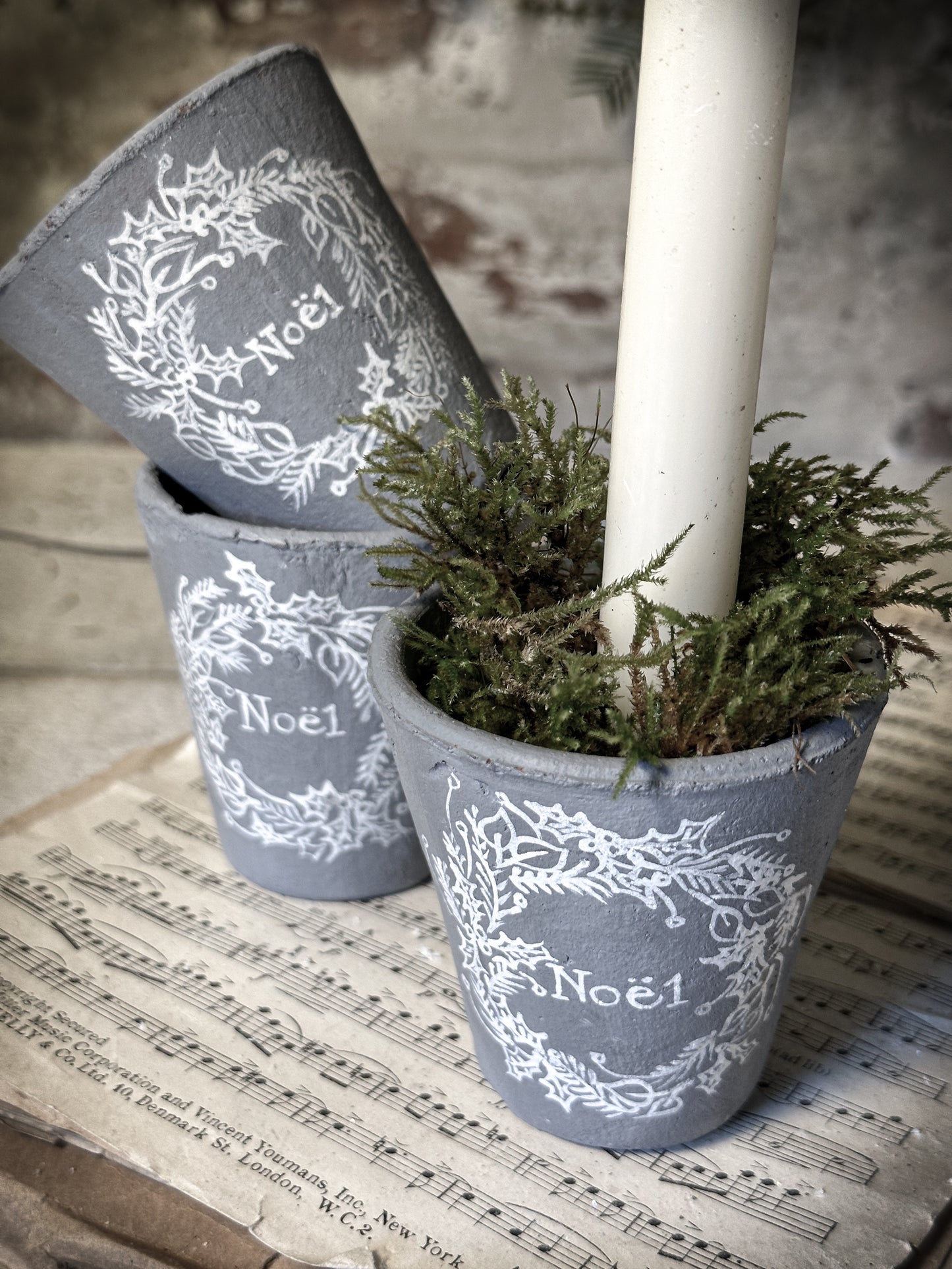 A small illustrated Victorian Christmas terracotta pot