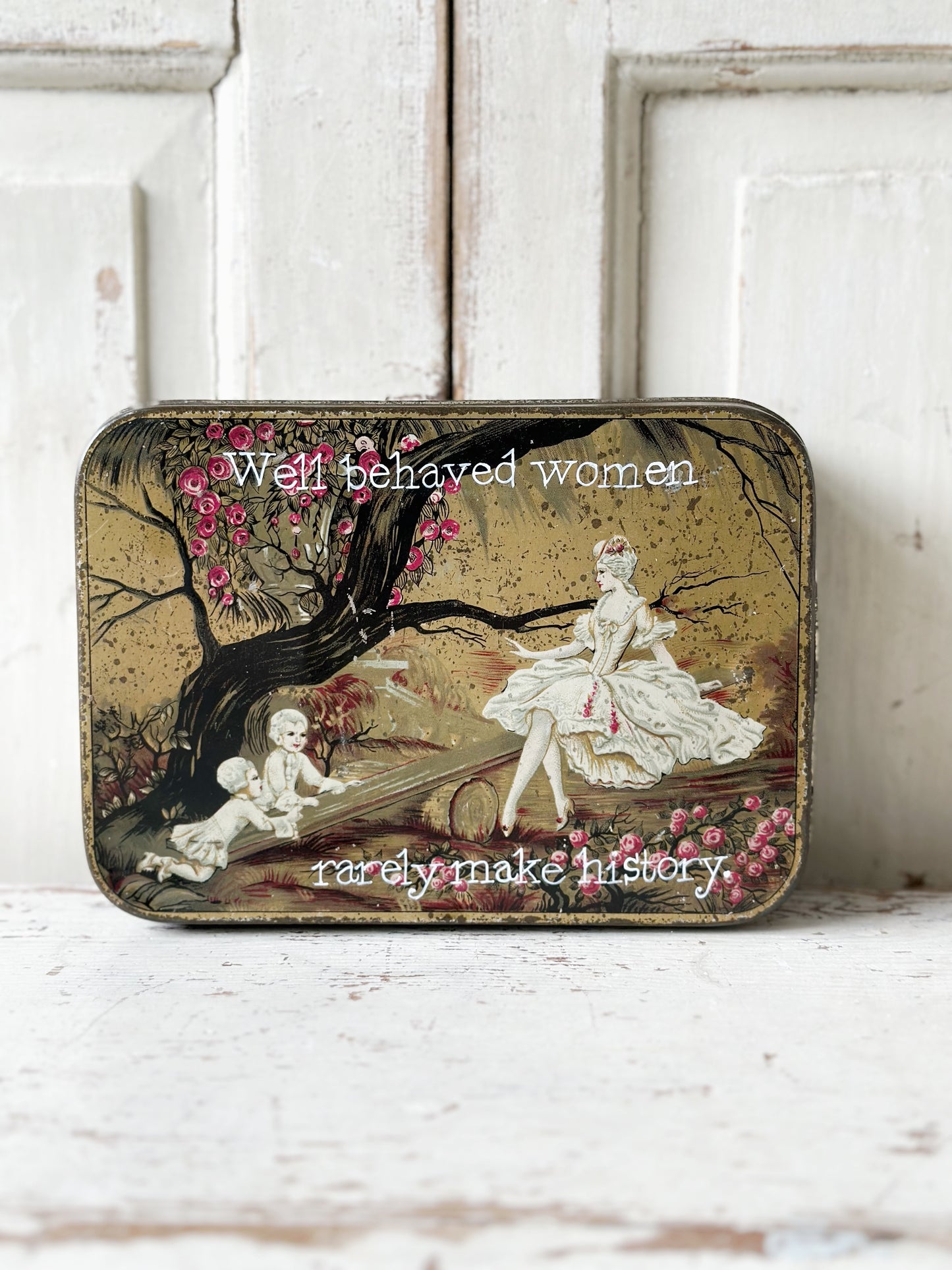 A pretty antique tin with a hand painted quote.