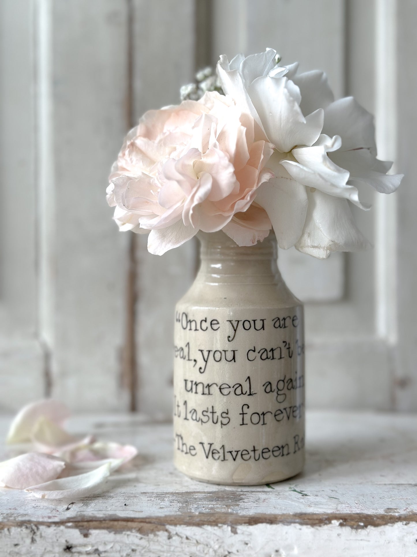 A Victorian unearthed stoneware pottery bottle with a hand painted quote