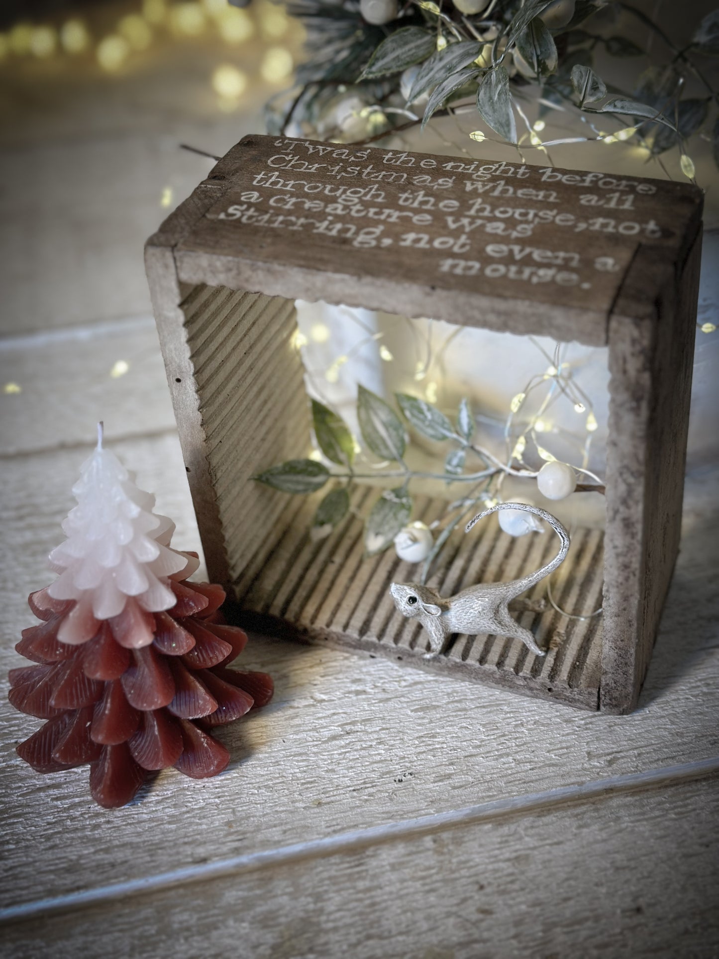A painted French cheese mould Christmas display