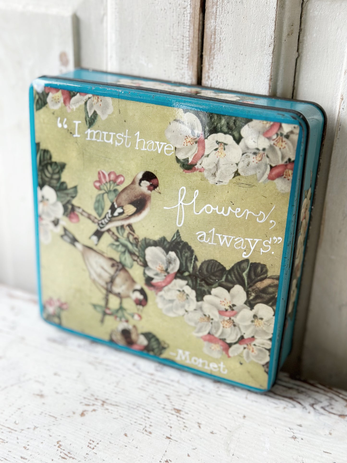 A pretty antique tin with a hand painted quote.