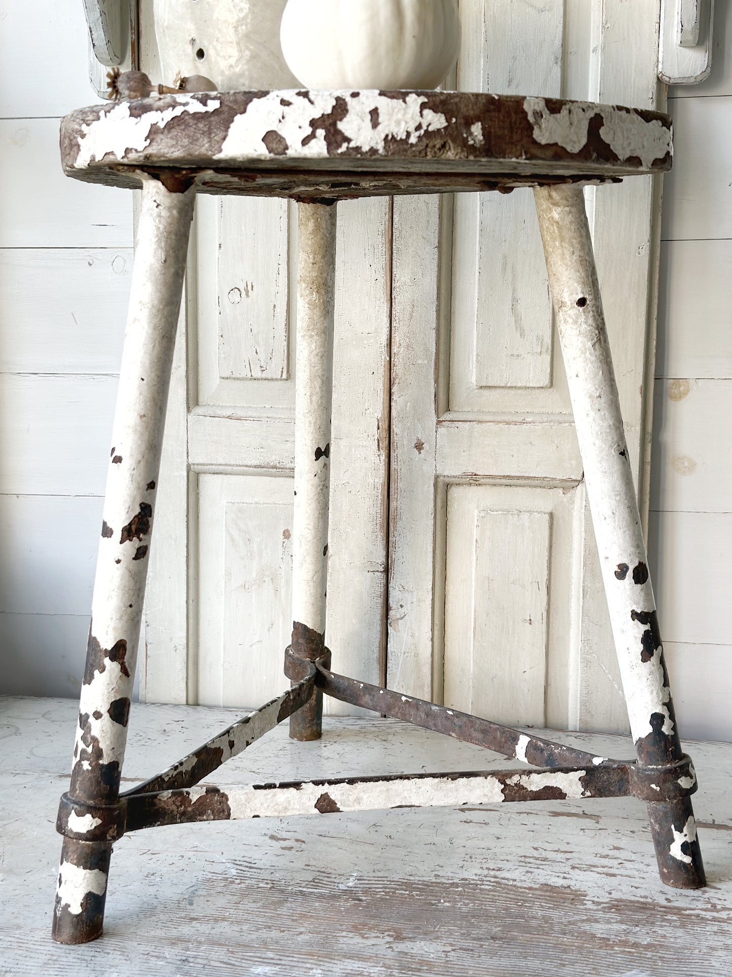 A chippy white French engineer’s stool 1930’s