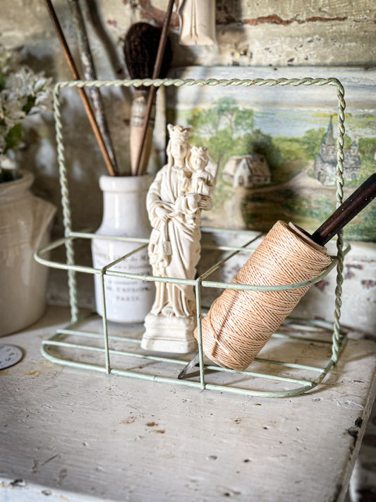 A Vintage French Wire Bottle Rack