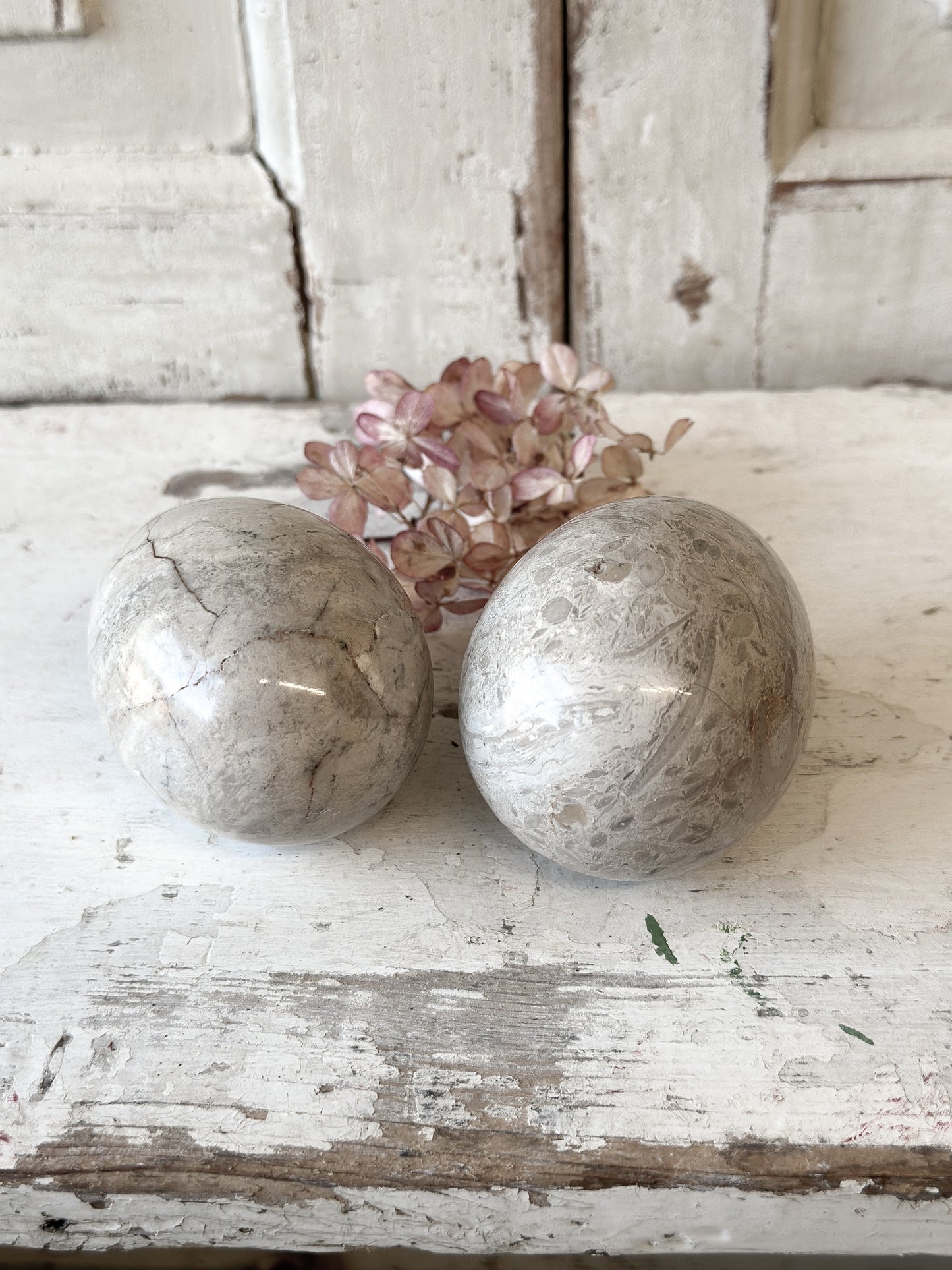 A pair of pretty vintage marble onyx eggs