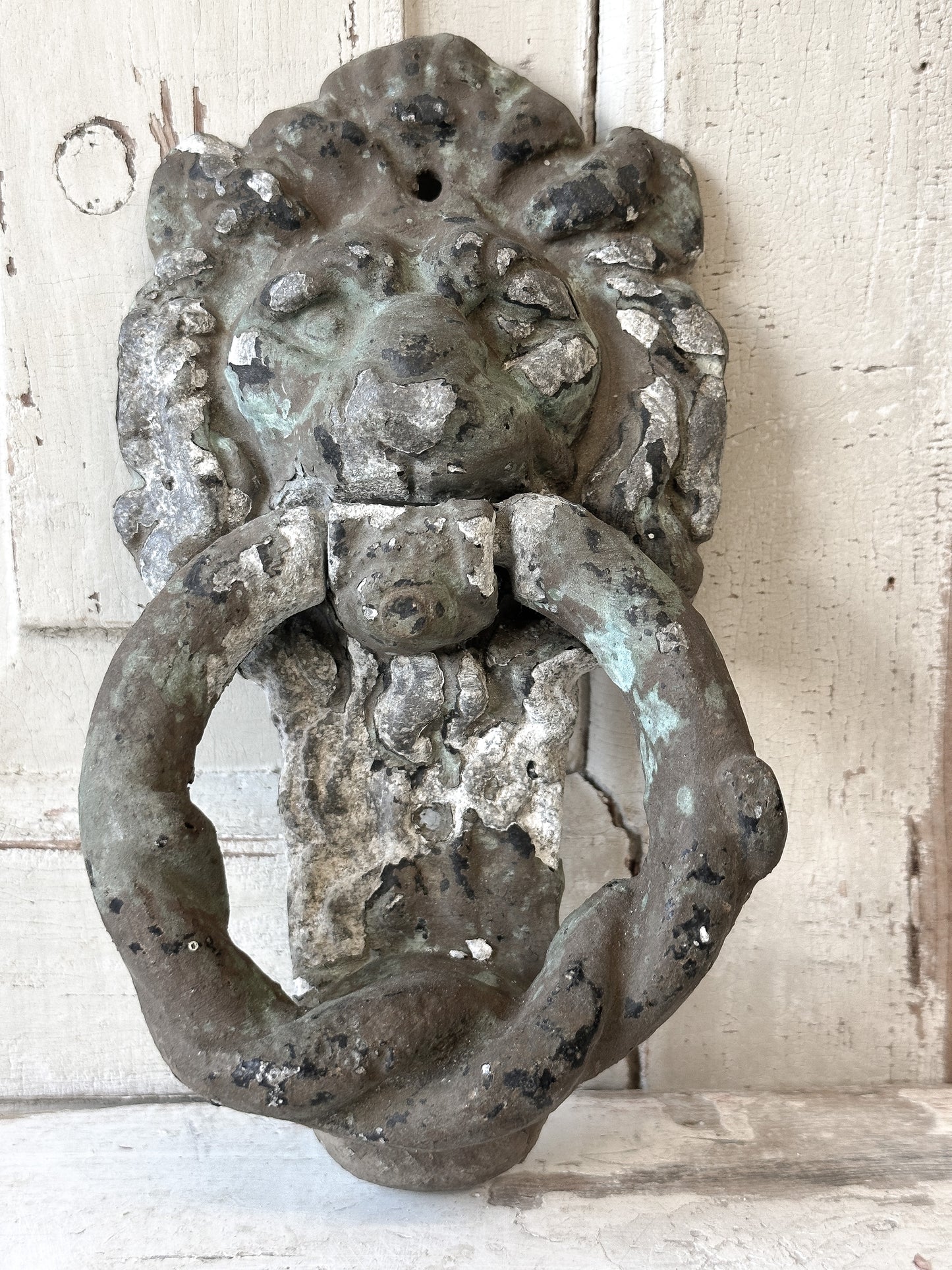 Beautiful weathered lion knocker