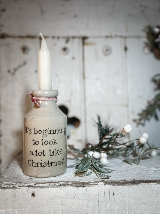 A Victorian unearthed stoneware pottery tall bottle with a hand painted quote