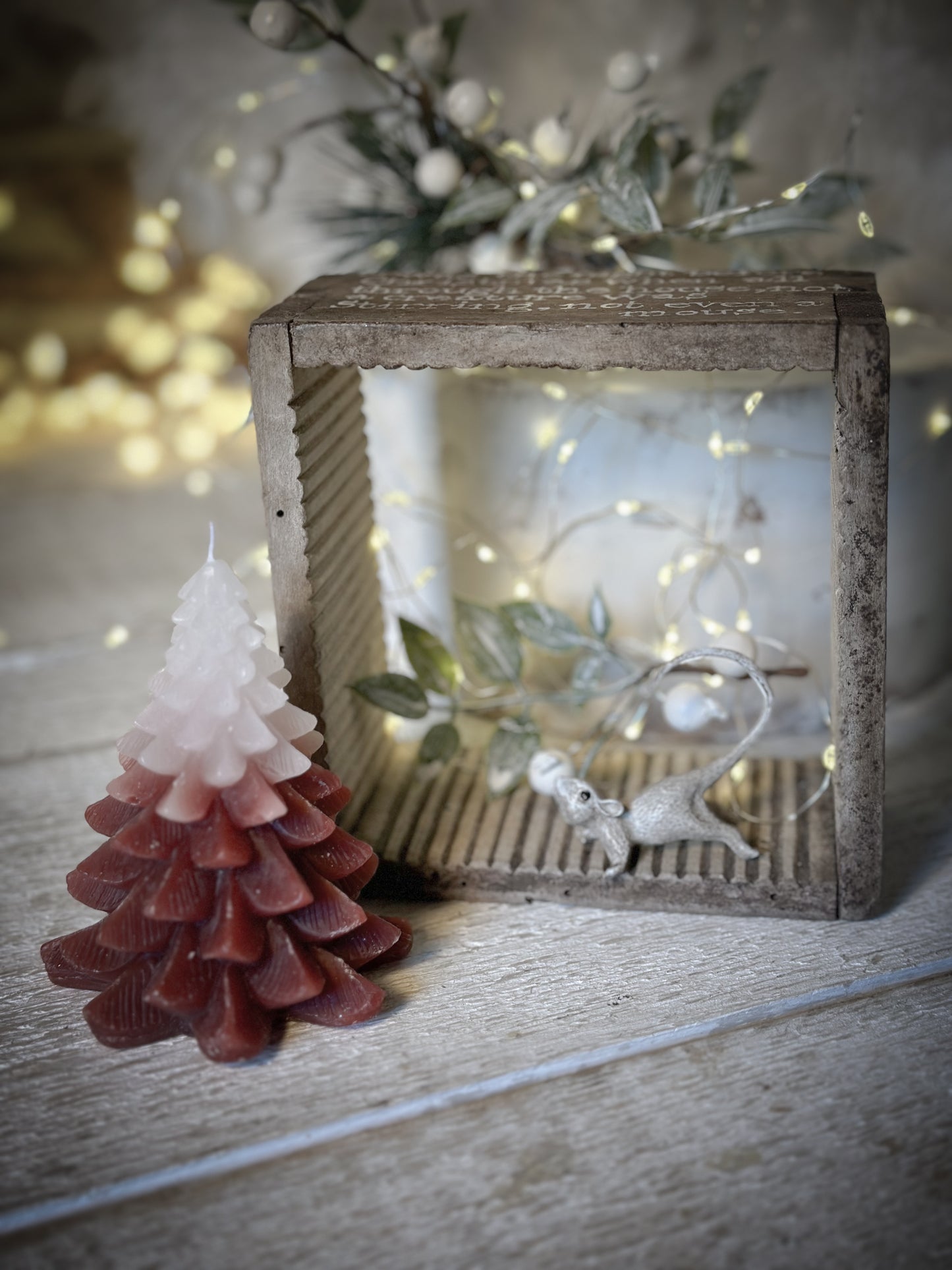 A painted French cheese mould Christmas display