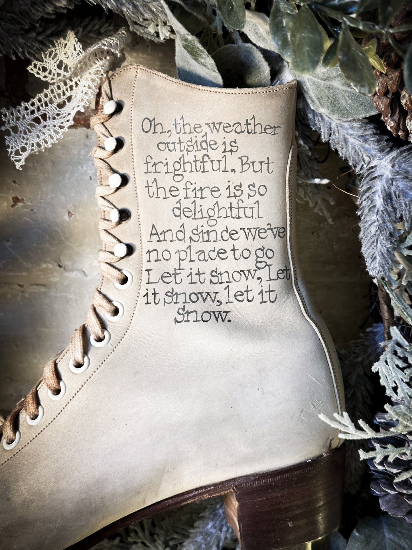 A beautiful vintage Christmas ice skate hand painted using traditional sign writer’s techniques and materials