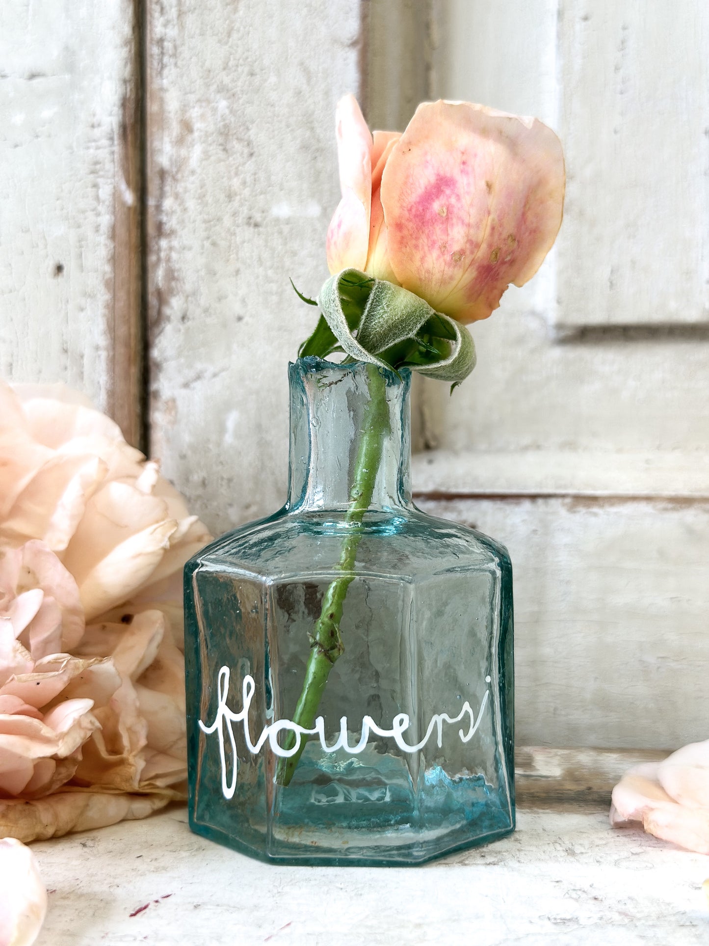 A beautiful Victorian bottle with a hand painted quote