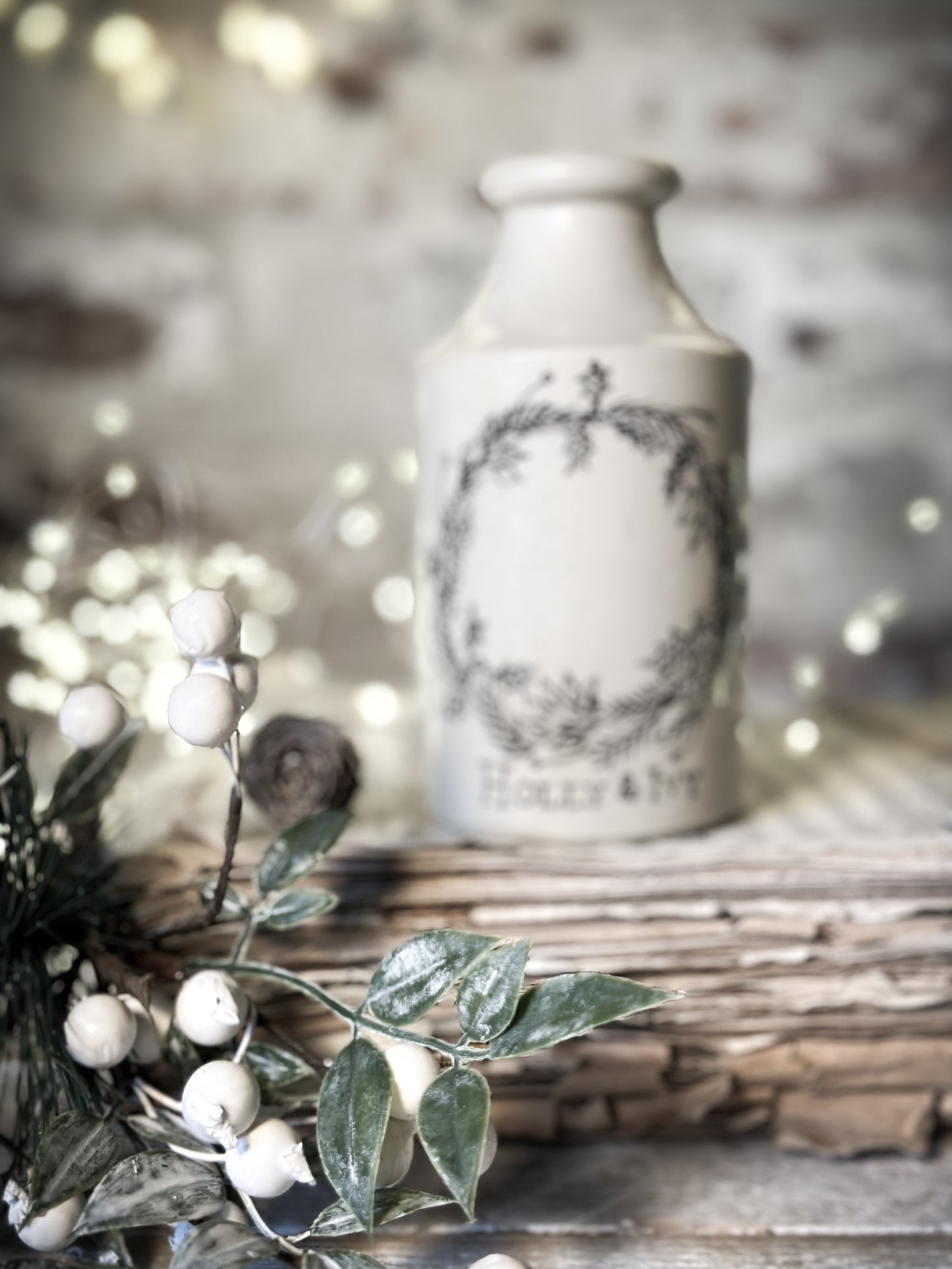A hand painted and illustrated vintage Victorian bottle