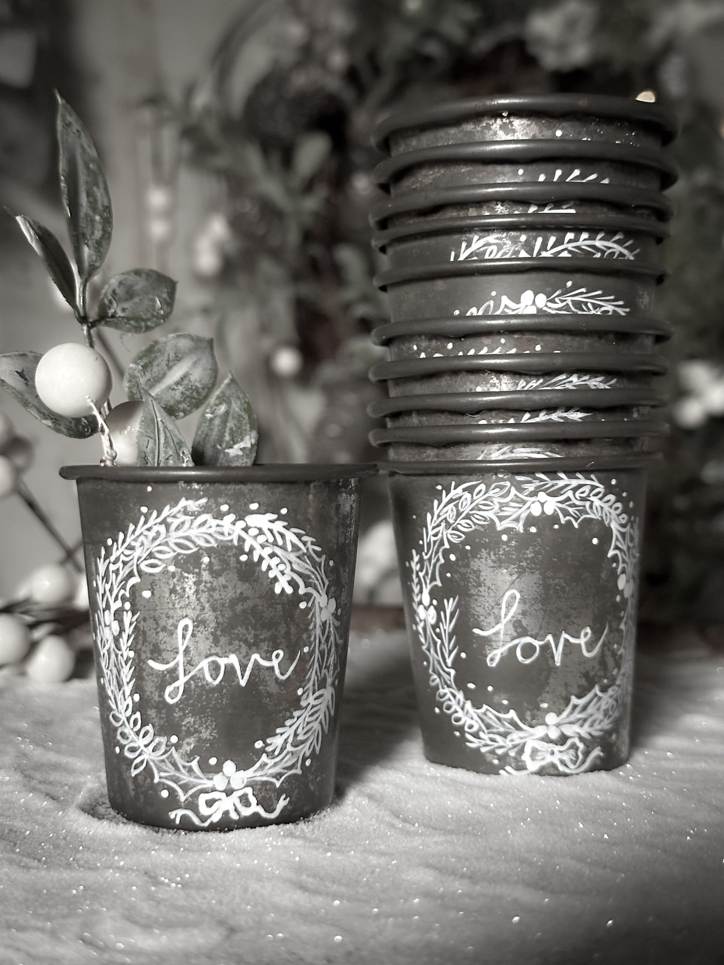 A pretty hand painted Dariole tin tea light holder