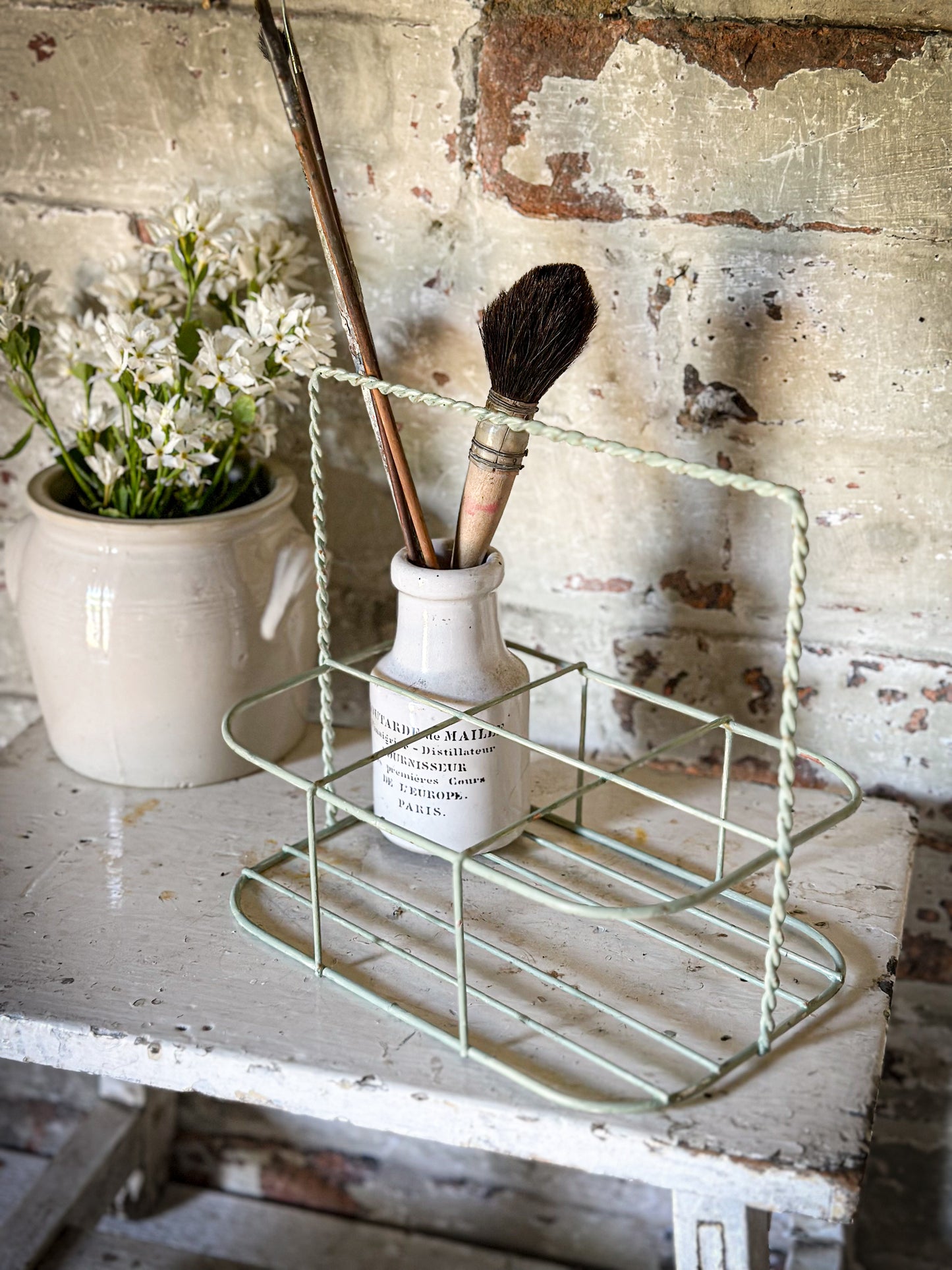A Vintage French Wire Bottle Rack