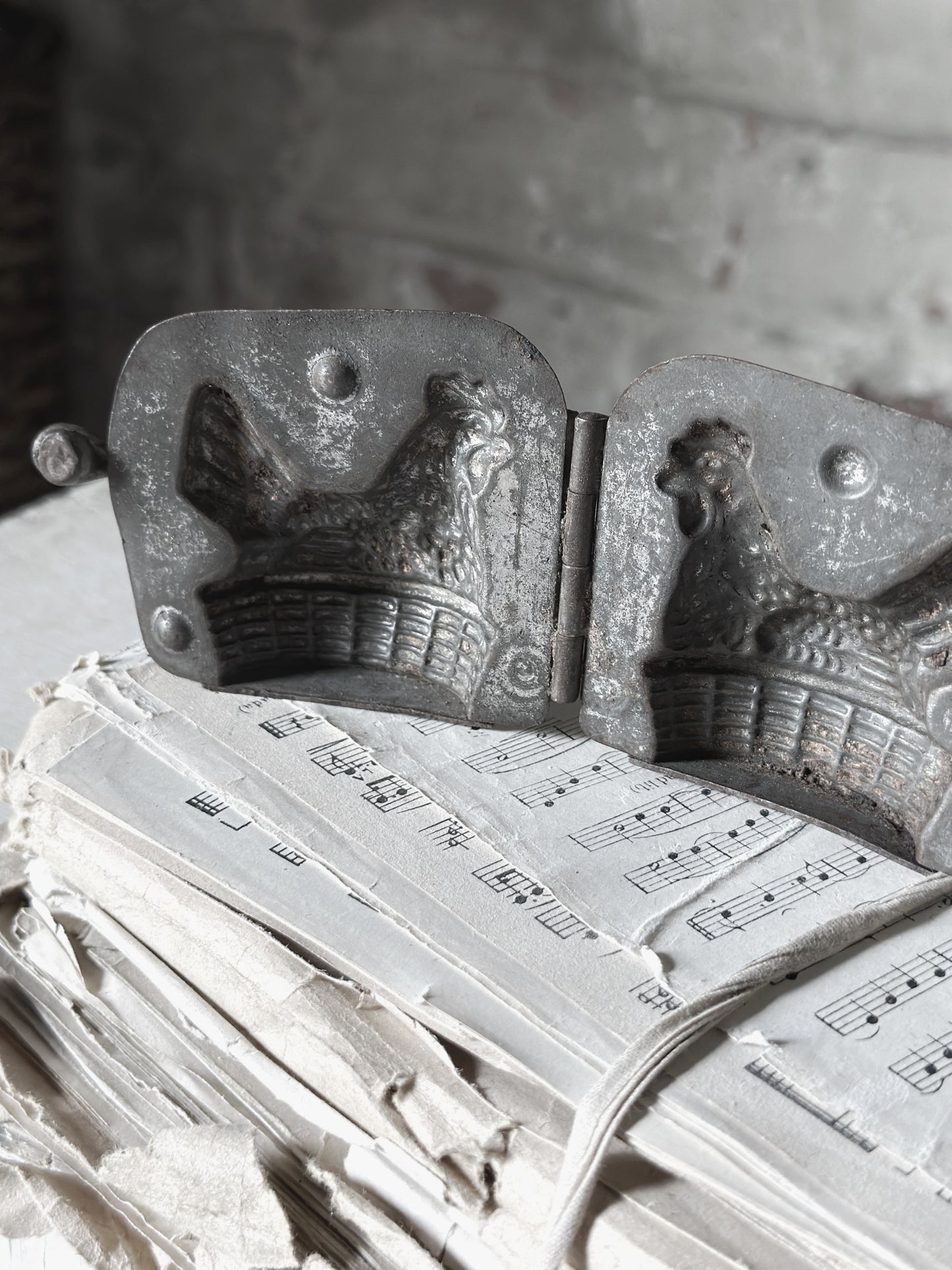 An Antique hinged chocolate mould hen