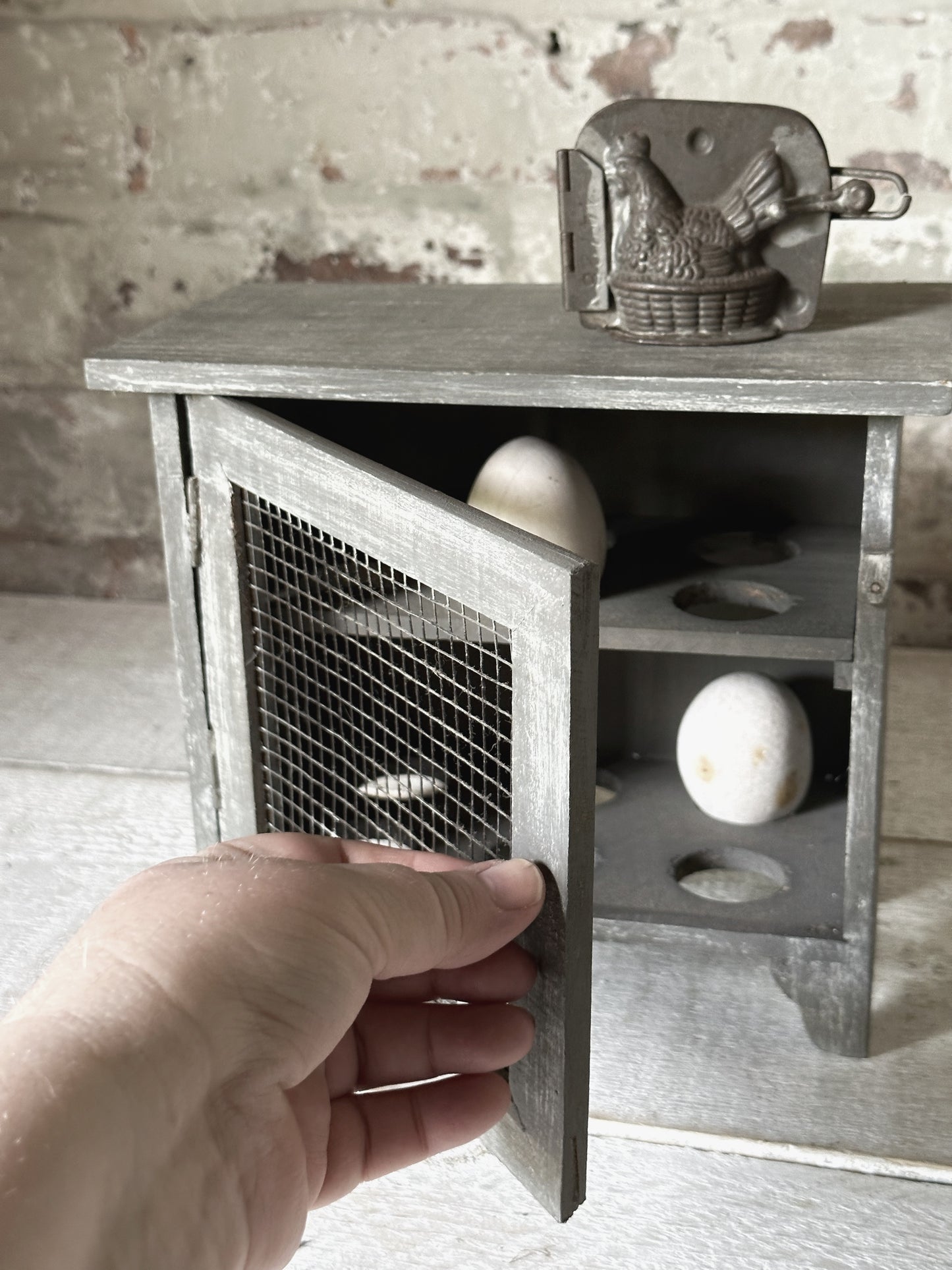 A vintage French chicken wire egg safe or egg cupboard egg holder egg rack