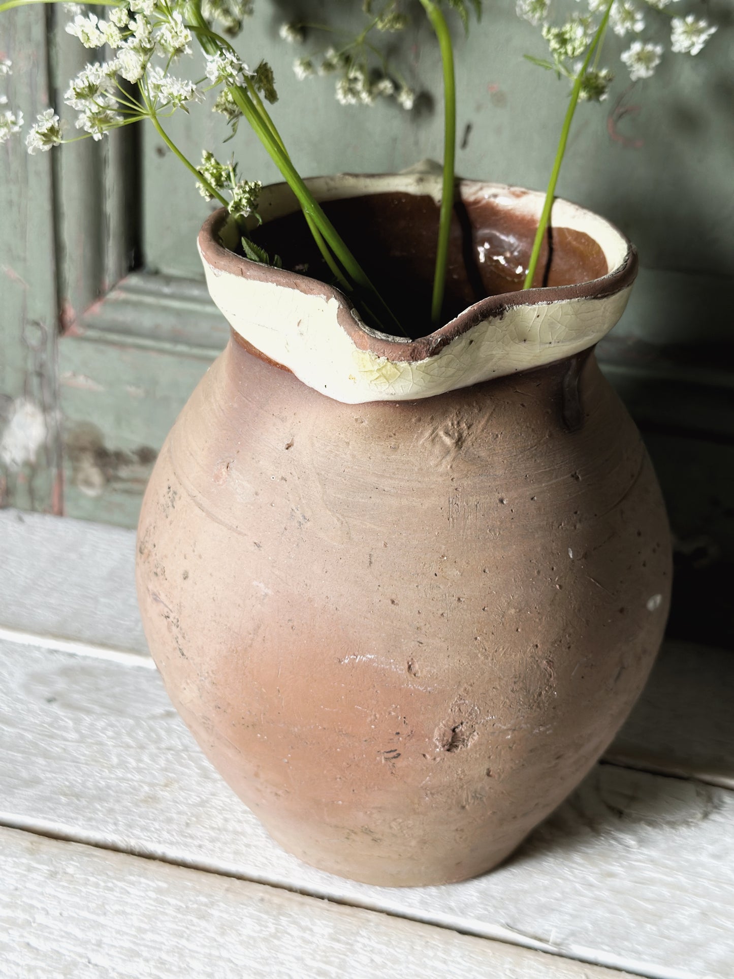 Antique pottery glazed dairy jug