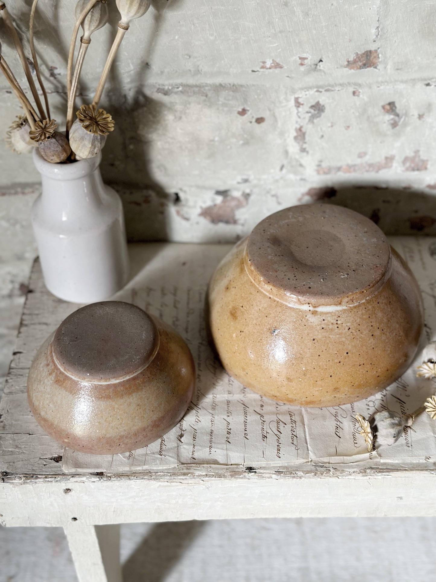 A pair of rustic antique French stoneware bowls