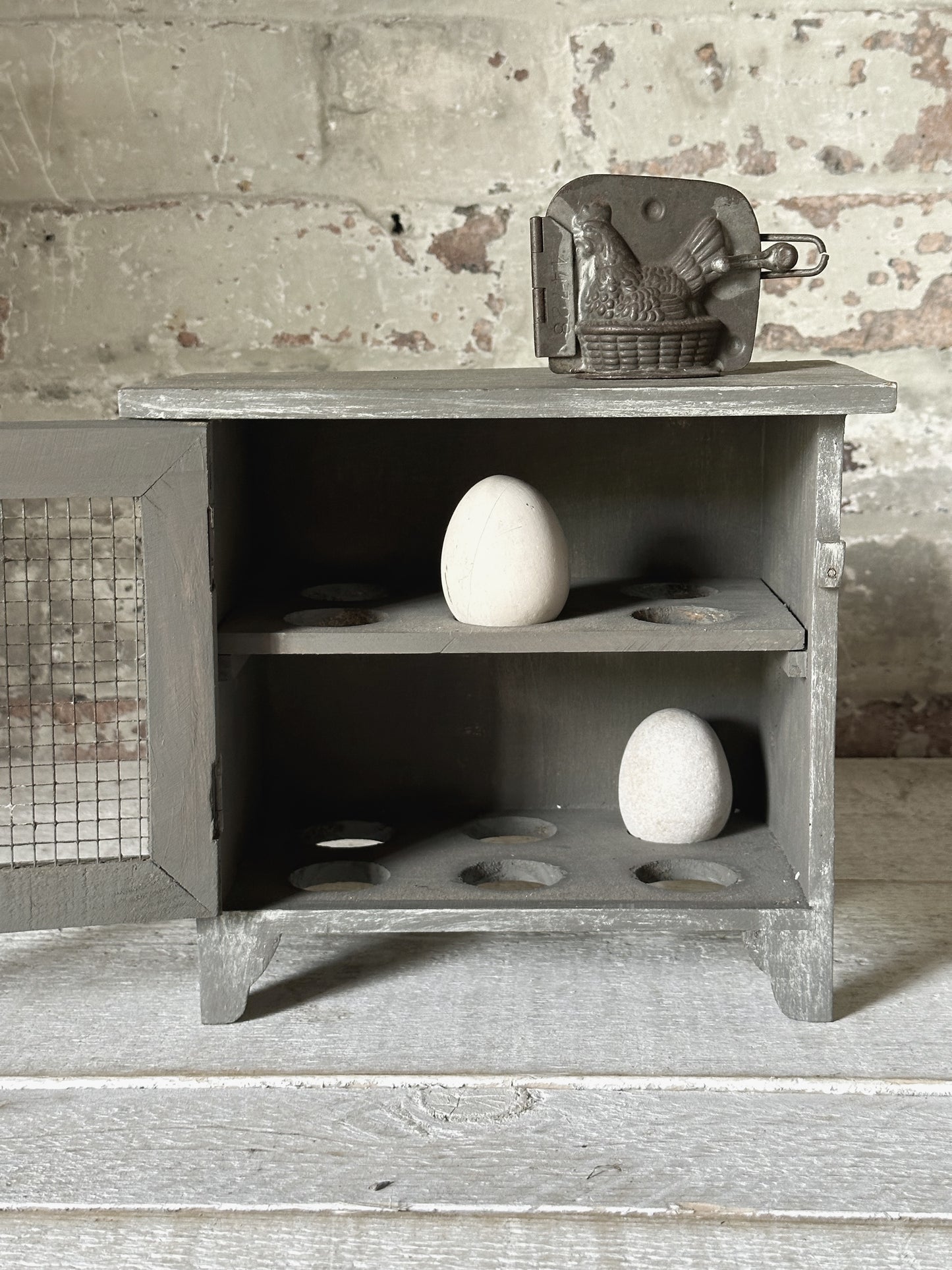 A vintage French chicken wire egg safe or egg cupboard egg holder egg rack
