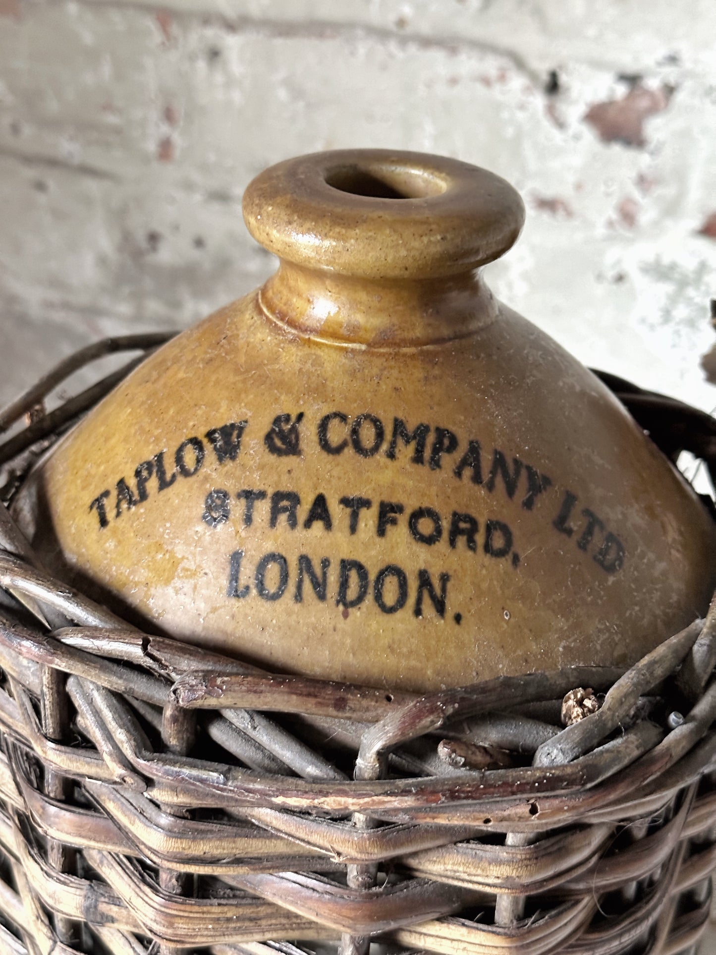 Incredible large wicker wine bottle “Taplow & Company Ltd. Stratford” by Skey Tamworth
