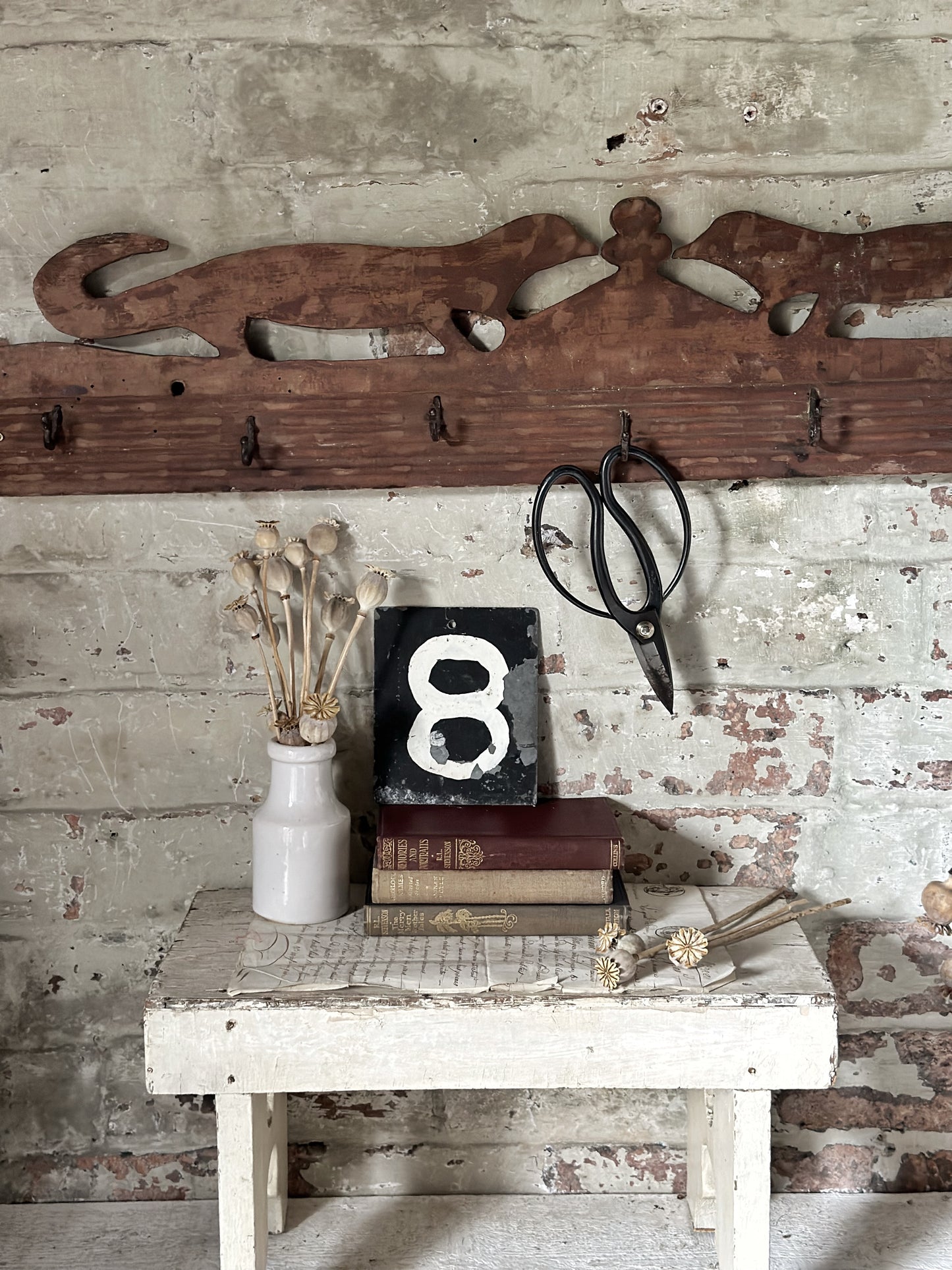 Antique primitive wooden game rack with stylised foxes