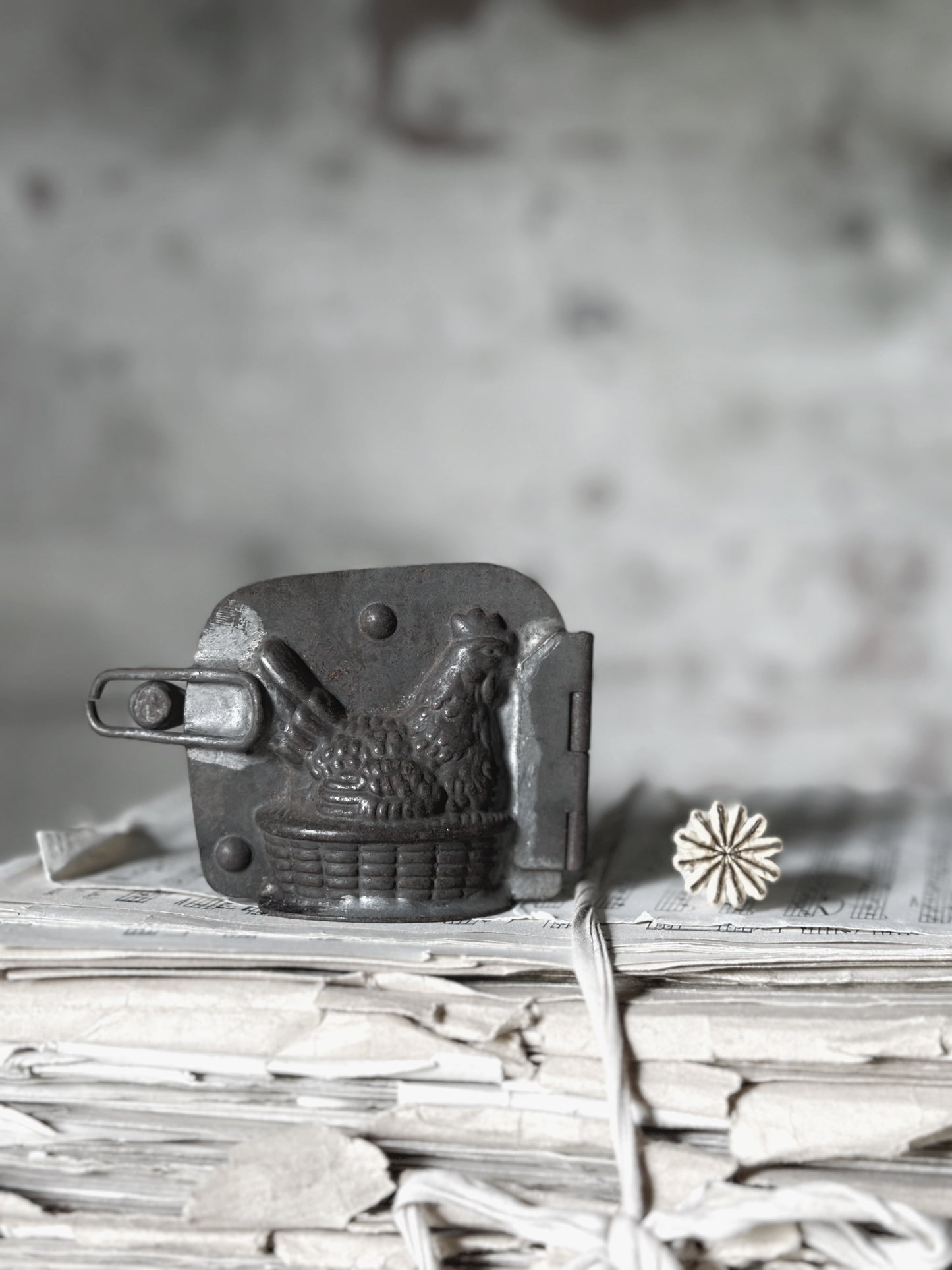 An Antique hinged chocolate mould hen