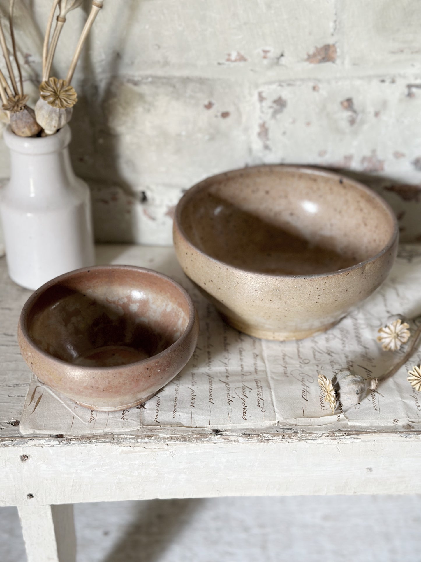 A pair of rustic antique French stoneware bowls