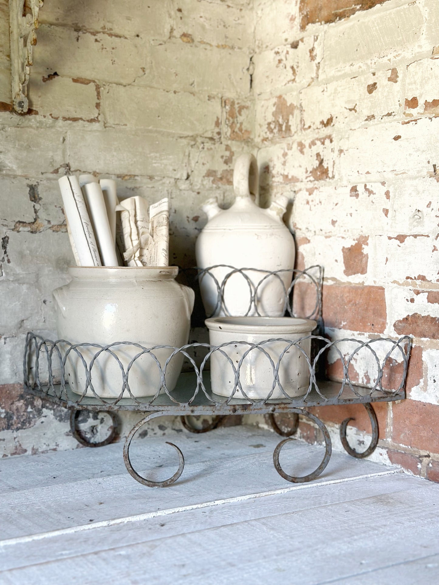 A vintage French stoneware gargoulette water bottle