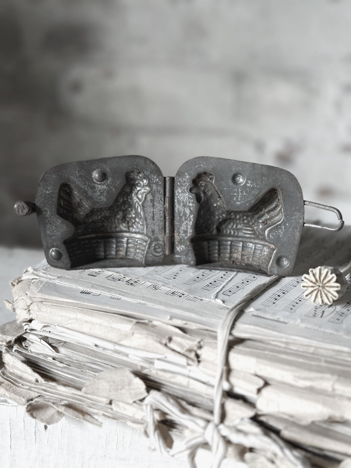 An Antique hinged chocolate mould hen