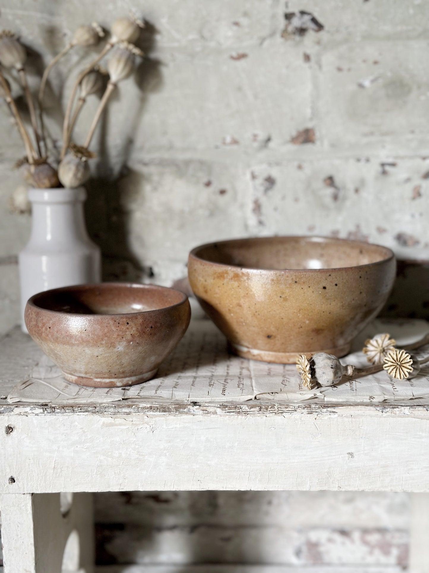 A pair of rustic antique French stoneware bowls