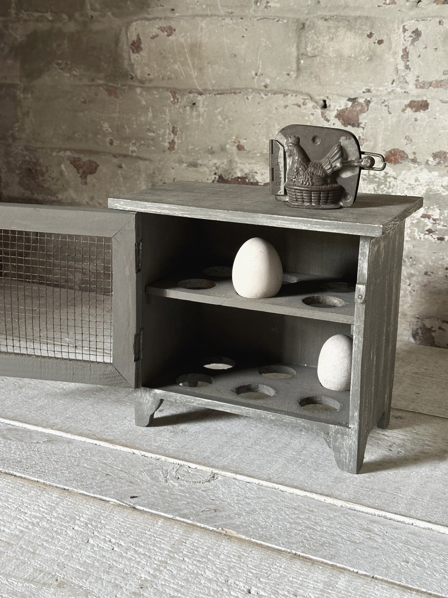 A vintage French chicken wire egg safe or egg cupboard egg holder egg rack